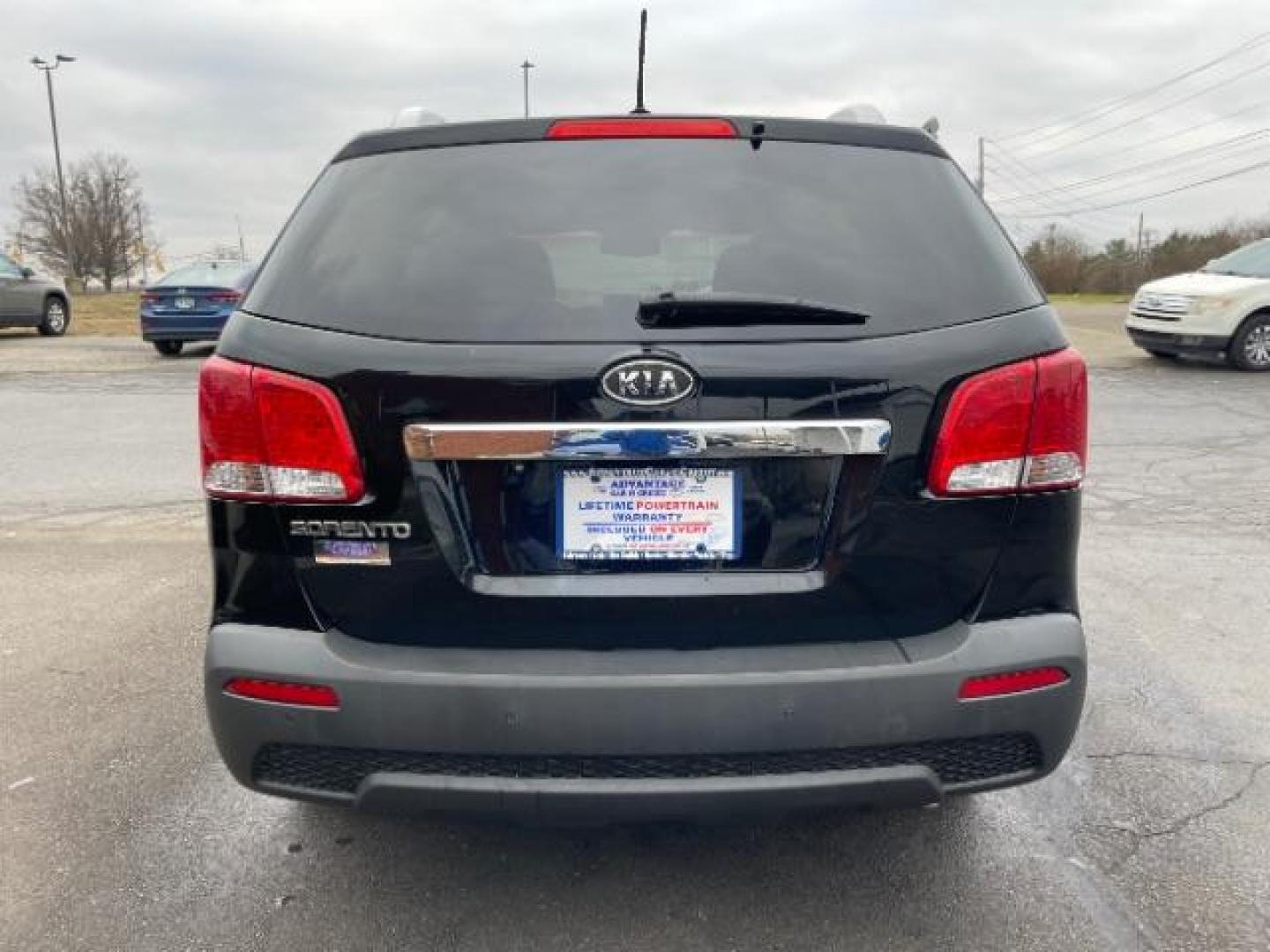 2012 Ebony Black Kia Sorento LX 4WD (5XYKTCA62CG) with an 2.4L L4 DOHC 16V engine, 6-Speed Automatic transmission, located at 4508 South Dixie Dr, Moraine, OH, 45439, (937) 908-9800, 39.690136, -84.216438 - Photo#4