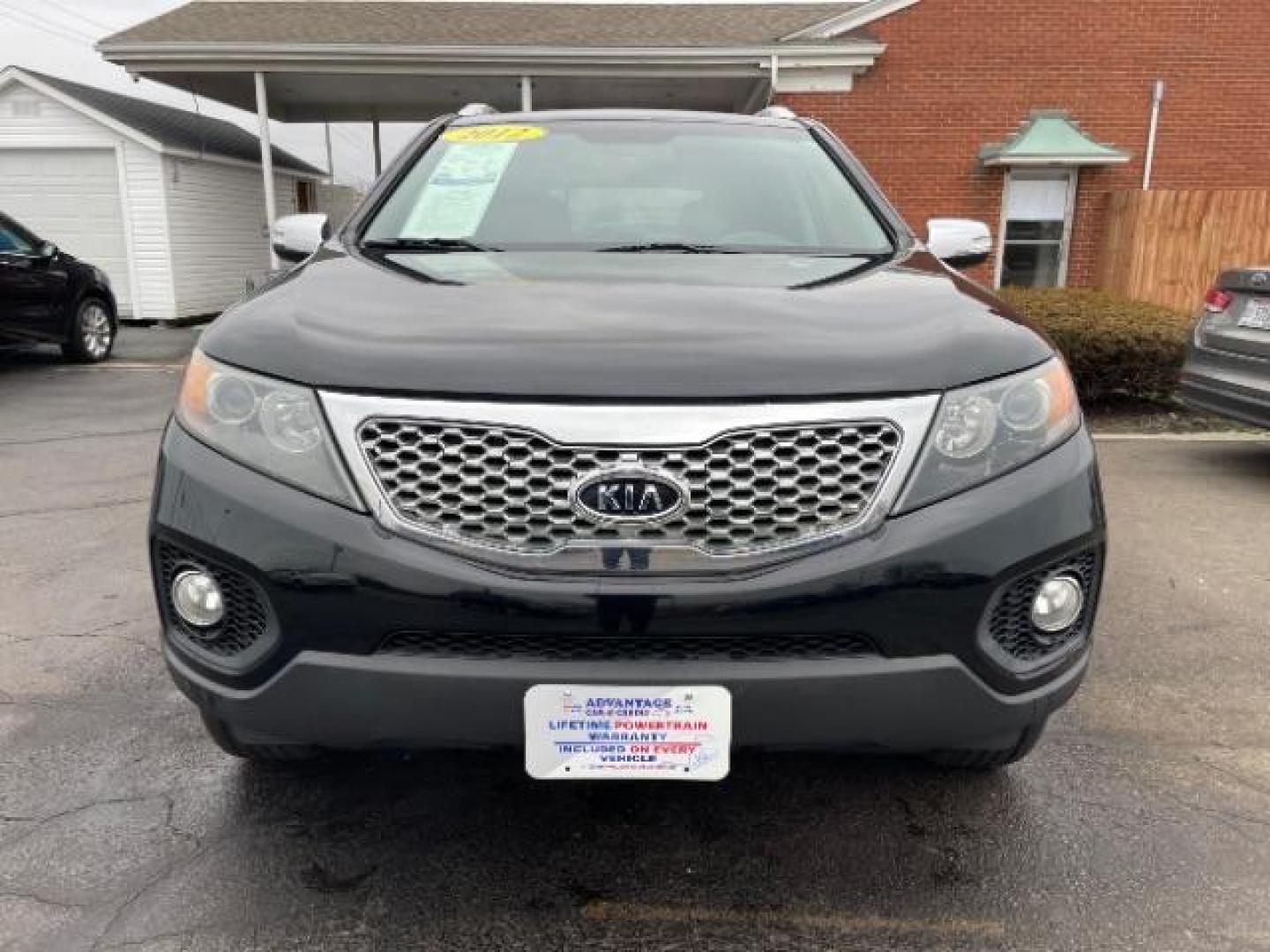 2012 Ebony Black Kia Sorento LX 4WD (5XYKTCA62CG) with an 2.4L L4 DOHC 16V engine, 6-Speed Automatic transmission, located at 4508 South Dixie Dr, Moraine, OH, 45439, (937) 908-9800, 39.690136, -84.216438 - Photo#5