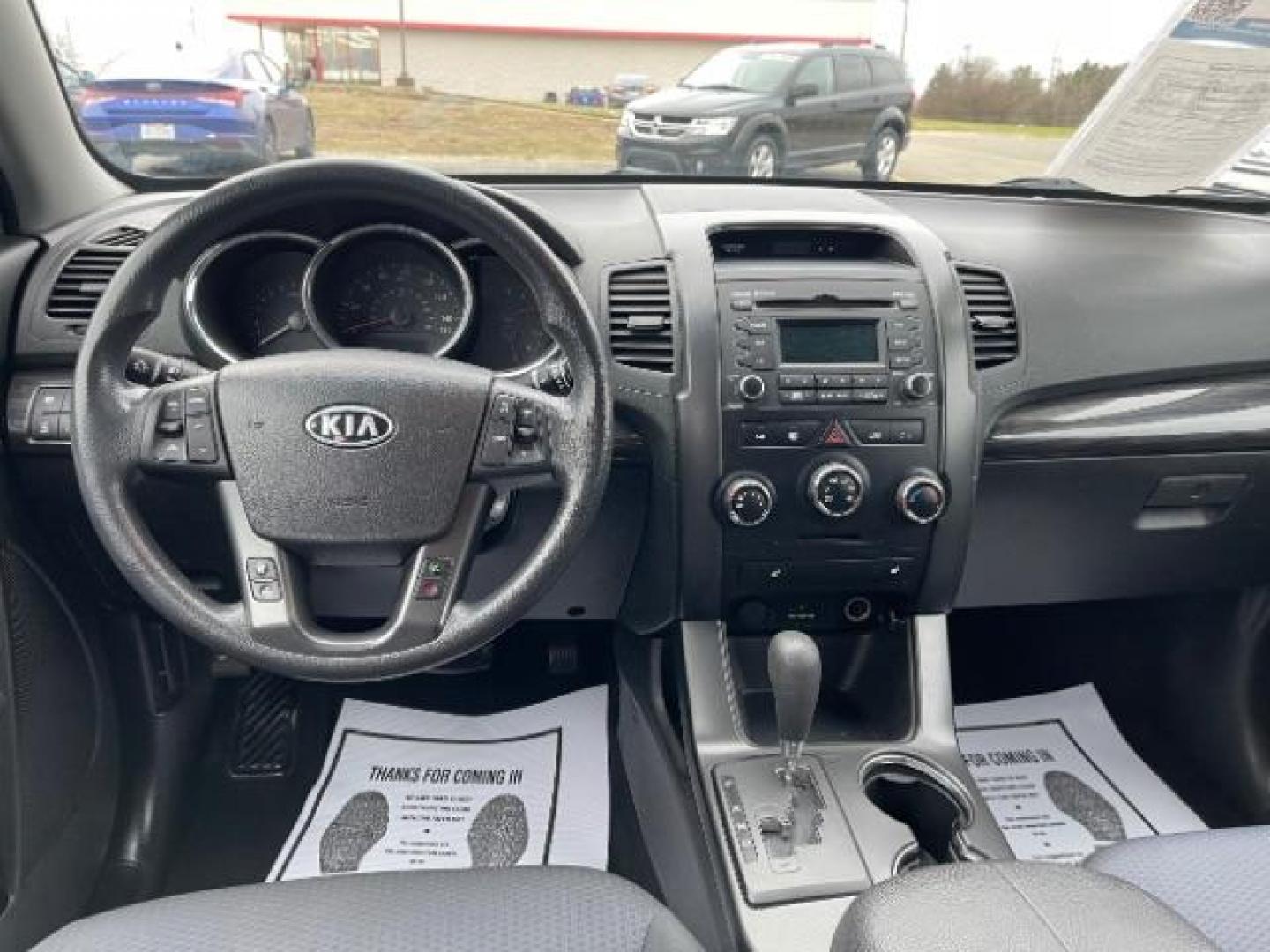 2012 Ebony Black Kia Sorento LX 4WD (5XYKTCA62CG) with an 2.4L L4 DOHC 16V engine, 6-Speed Automatic transmission, located at 4508 South Dixie Dr, Moraine, OH, 45439, (937) 908-9800, 39.690136, -84.216438 - Photo#7