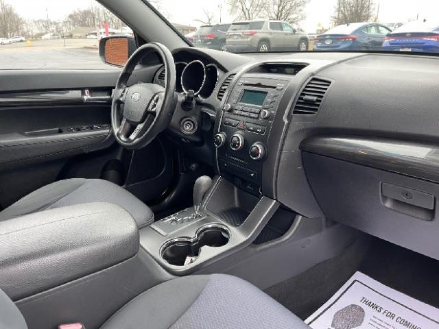 2012 Ebony Black Kia Sorento LX 4WD (5XYKTCA62CG) with an 2.4L L4 DOHC 16V engine, 6-Speed Automatic transmission, located at 4508 South Dixie Dr, Moraine, OH, 45439, (937) 908-9800, 39.690136, -84.216438 - Photo#8