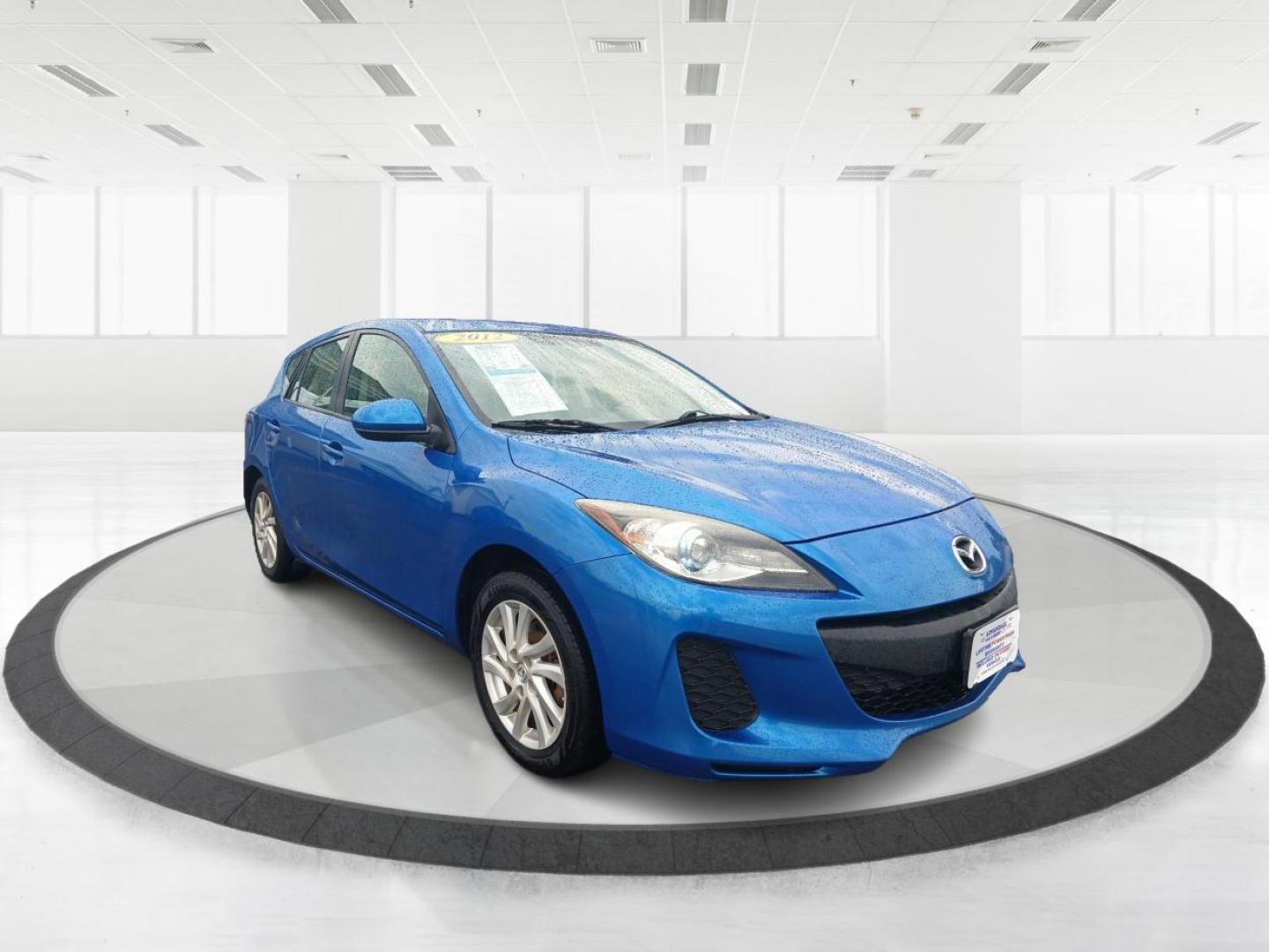 2012 Sky Blue Mica Mazda MAZDA3 I Grand Touring 5-Door (JM1BL1M72C1) with an 2.0L L4 DOHC 16V engine, located at 401 Woodman Dr, Riverside, OH, 45431, (937) 908-9800, 39.763779, -84.122063 - Photo#0