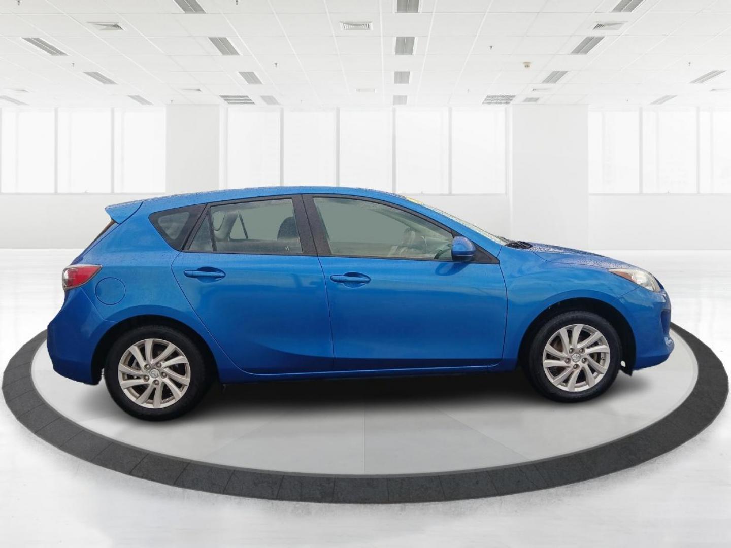 2012 Sky Blue Mica Mazda MAZDA3 I Grand Touring 5-Door (JM1BL1M72C1) with an 2.0L L4 DOHC 16V engine, located at 401 Woodman Dr, Riverside, OH, 45431, (937) 908-9800, 39.763779, -84.122063 - Photo#1