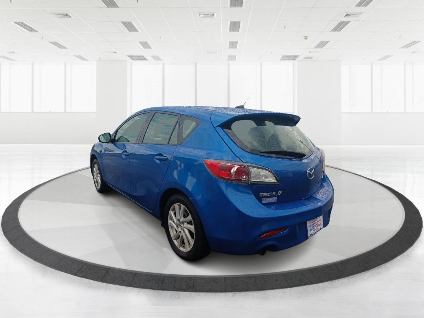 2012 Sky Blue Mica Mazda MAZDA3 I Grand Touring 5-Door (JM1BL1M72C1) with an 2.0L L4 DOHC 16V engine, located at 401 Woodman Dr, Riverside, OH, 45431, (937) 908-9800, 39.763779, -84.122063 - Photo#4