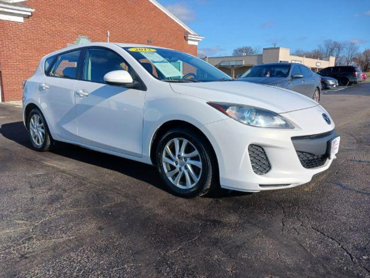 2012 Crystal White Pearl Mica Mazda MAZDA3 I Grand Touring 5-Door (JM1BL1M79C1) with an 2.0L L4 DOHC 16V engine, located at 1099 N County Rd 25A, OH, 45373, (937) 908-9800, 40.057079, -84.212883 - Photo#0