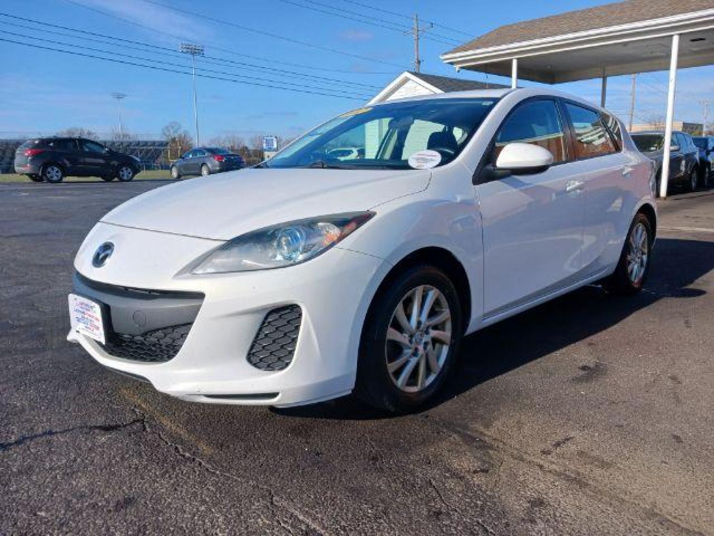 2012 Crystal White Pearl Mica Mazda MAZDA3 I Grand Touring 5-Door (JM1BL1M79C1) with an 2.0L L4 DOHC 16V engine, located at 1099 N County Rd 25A, OH, 45373, (937) 908-9800, 40.057079, -84.212883 - Photo#2