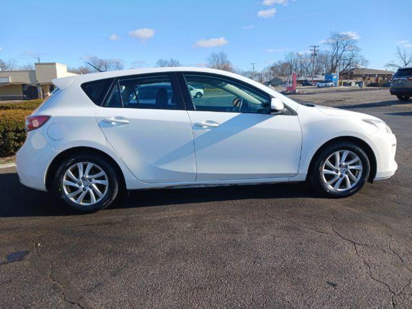 2012 Crystal White Pearl Mica Mazda MAZDA3 I Grand Touring 5-Door (JM1BL1M79C1) with an 2.0L L4 DOHC 16V engine, located at 1099 N County Rd 25A, OH, 45373, (937) 908-9800, 40.057079, -84.212883 - Photo#4