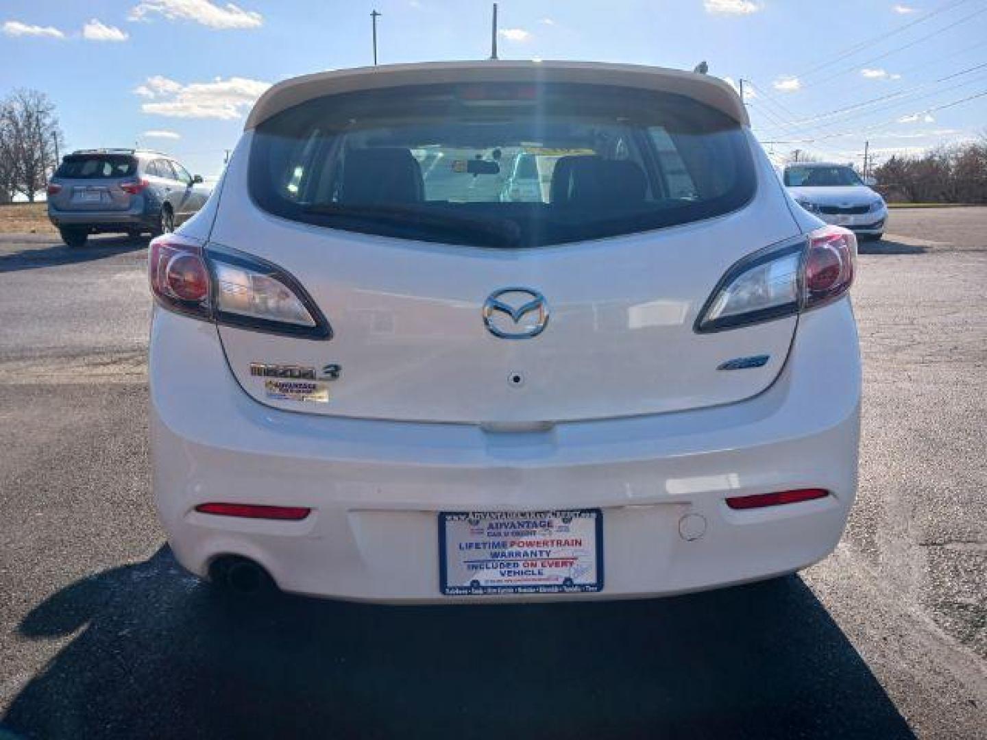 2012 Crystal White Pearl Mica Mazda MAZDA3 I Grand Touring 5-Door (JM1BL1M79C1) with an 2.0L L4 DOHC 16V engine, located at 1099 N County Rd 25A, OH, 45373, (937) 908-9800, 40.057079, -84.212883 - Photo#5