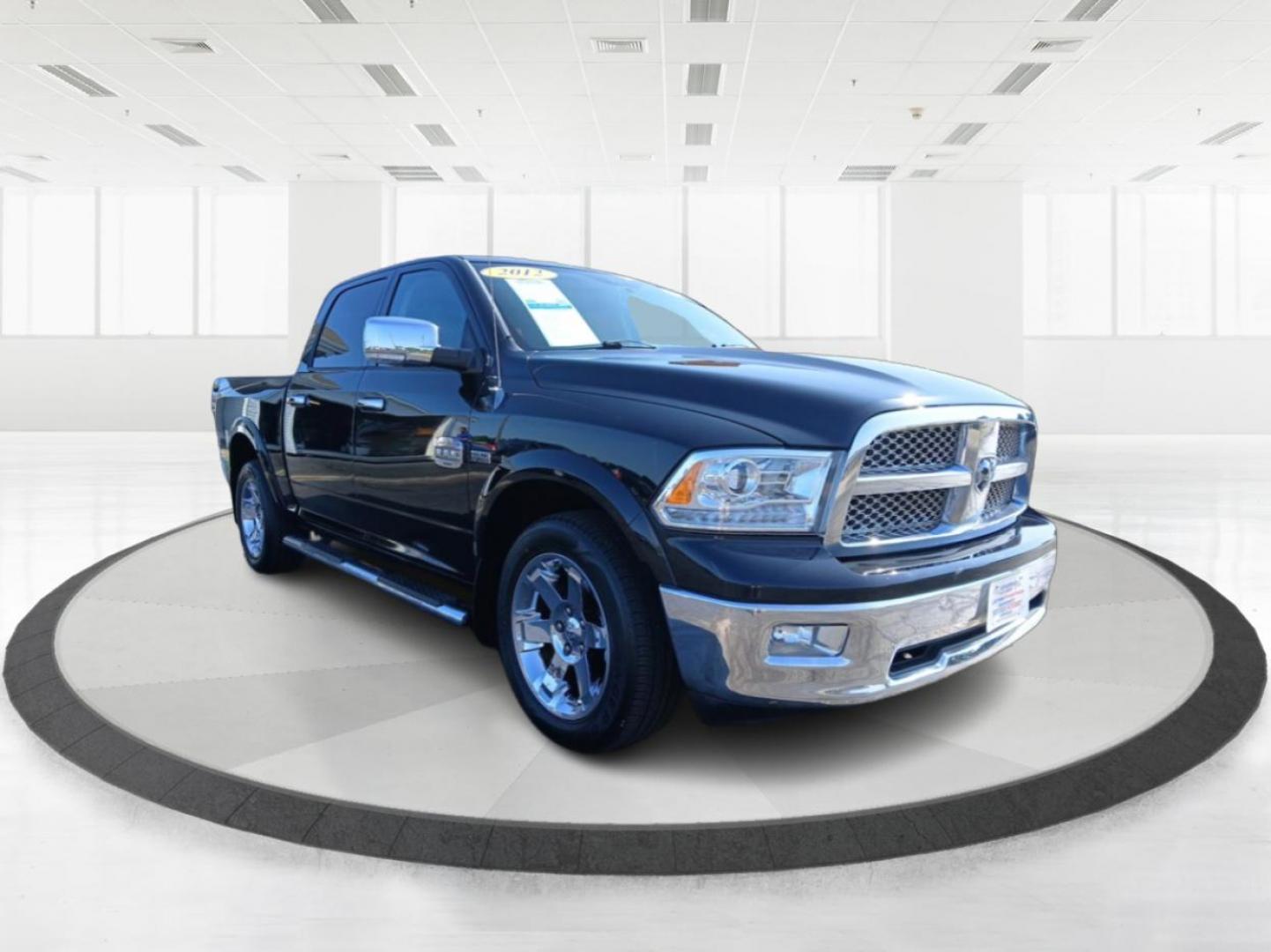 2012 RAM 1500 Laramie Longhorn Edition Crew Cab 4WD (1C6RD7PT6CS) with an 5.7L V8 OHV 16V engine, 6-Speed Automatic transmission, located at 1951 S Dayton Lakeview Rd., New Carlisle, OH, 45344, (937) 908-9800, 39.890999, -84.050255 - One Owner - Photo#0