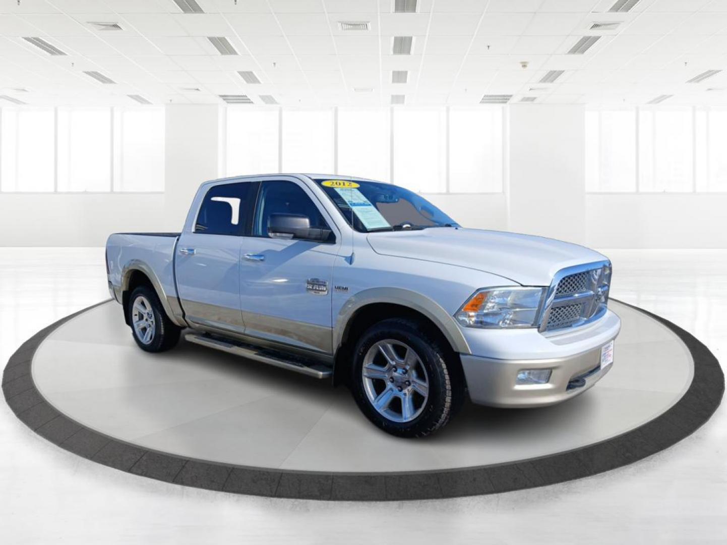 2012 RAM 1500 Laramie Longhorn Edition Crew Cab 4WD (1C6RD7PT8CS) with an 5.7L V8 OHV 16V engine, 6-Speed Automatic transmission, located at 8750 N County Rd 25A, Piqua, OH, 45356, (937) 908-9800, 40.164391, -84.232513 - 2012 RAM 1500 Laramie Longhorn Edition Crew Cab 4WD - Photo#0