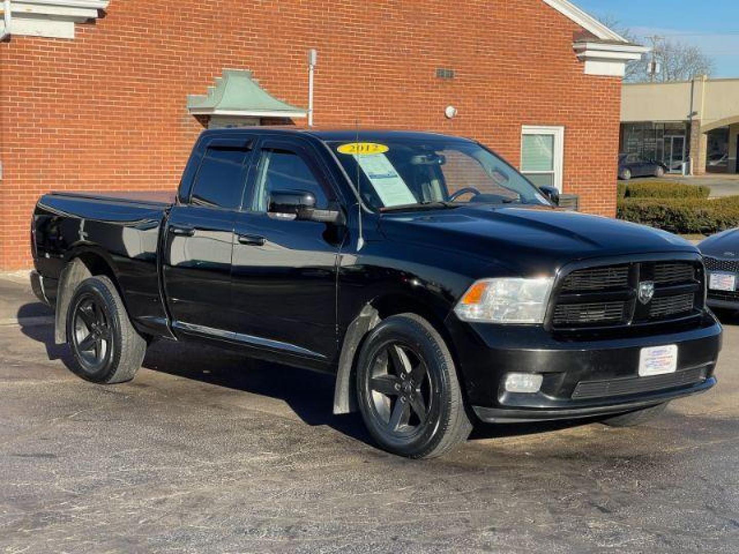 2012 Black RAM 1500 Sport Quad Cab 4WD (1C6RD7HT2CS) with an 5.7L V8 OHV 16V engine, 6-Speed Automatic transmission, located at 401 Woodman Dr, Riverside, OH, 45431, (937) 908-9800, 39.763779, -84.122063 - Photo#0