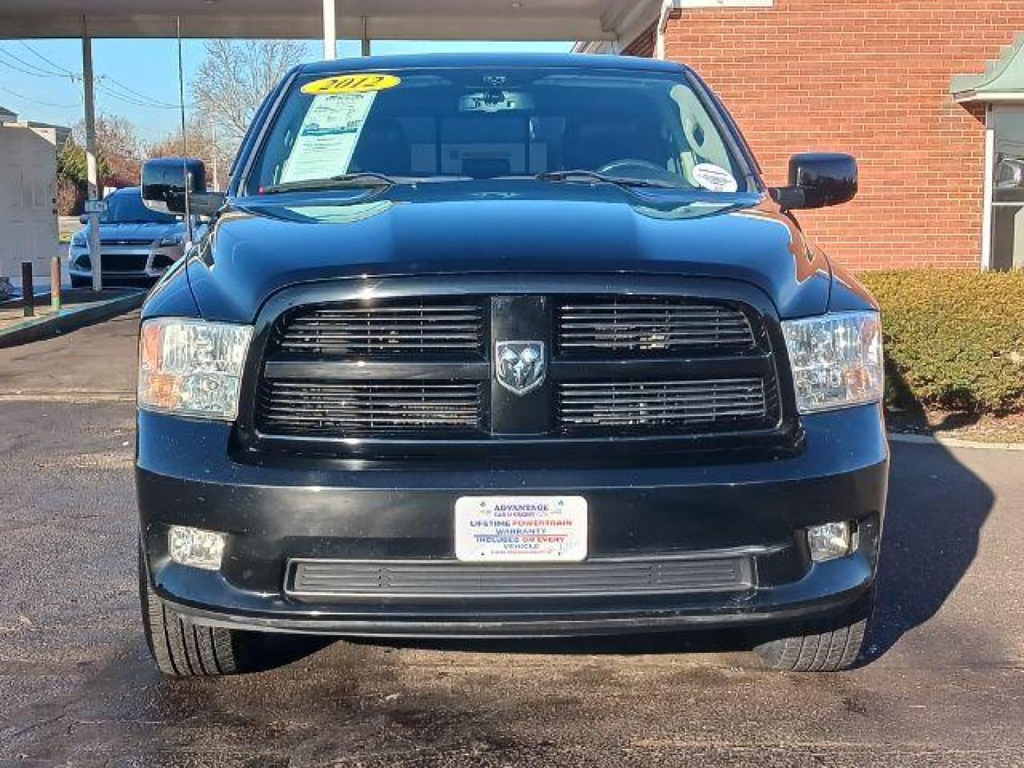 2012 Black RAM 1500 Sport Quad Cab 4WD (1C6RD7HT2CS) with an 5.7L V8 OHV 16V engine, 6-Speed Automatic transmission, located at 401 Woodman Dr, Riverside, OH, 45431, (937) 908-9800, 39.763779, -84.122063 - Photo#1