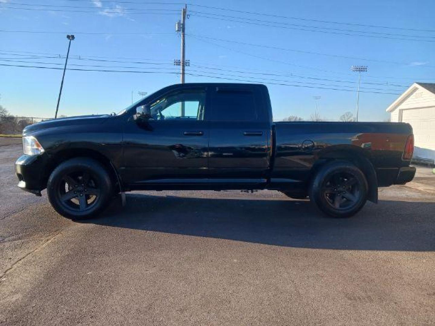 2012 Black RAM 1500 Sport Quad Cab 4WD (1C6RD7HT2CS) with an 5.7L V8 OHV 16V engine, 6-Speed Automatic transmission, located at 401 Woodman Dr, Riverside, OH, 45431, (937) 908-9800, 39.763779, -84.122063 - Photo#3