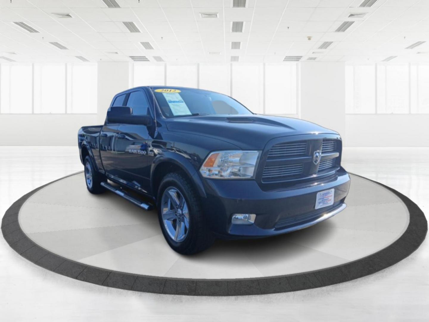 2012 True Blue Pearl RAM 1500 Sport Quad Cab 4WD (1C6RD7HT2CS) with an 5.7L V8 OHV 16V engine, 6-Speed Automatic transmission, located at 4508 South Dixie Dr, Moraine, OH, 45439, (937) 908-9800, 39.690136, -84.216438 - Photo#0