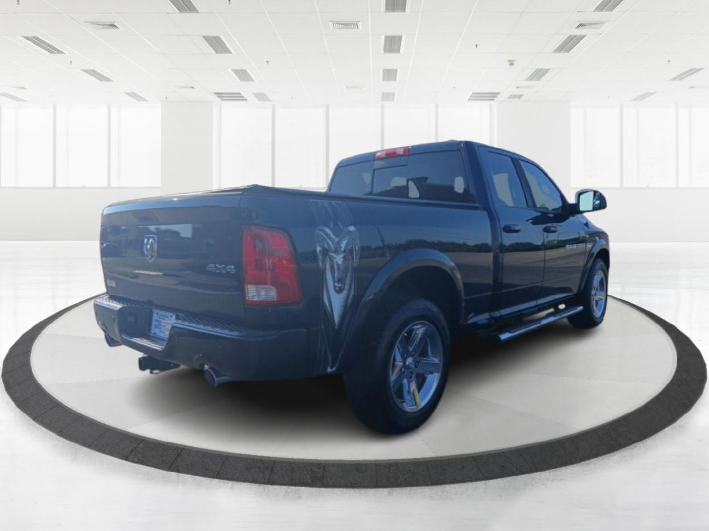 2012 True Blue Pearl RAM 1500 Sport Quad Cab 4WD (1C6RD7HT2CS) with an 5.7L V8 OHV 16V engine, 6-Speed Automatic transmission, located at 4508 South Dixie Dr, Moraine, OH, 45439, (937) 908-9800, 39.690136, -84.216438 - Photo#2