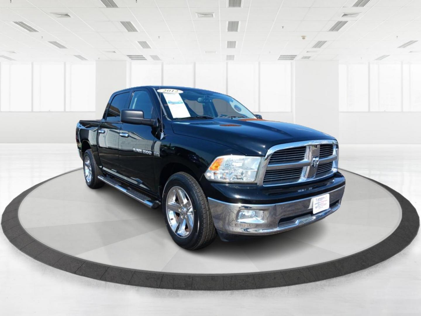 2012 Black RAM 1500 SLT Crew Cab 4WD (1C6RD7LT1CS) with an 5.7L V8 OHV 16V engine, 6-Speed Automatic transmission, located at 1230 East Main St, Xenia, OH, 45385, (937) 908-9800, 39.687321, -83.910294 - Photo#0