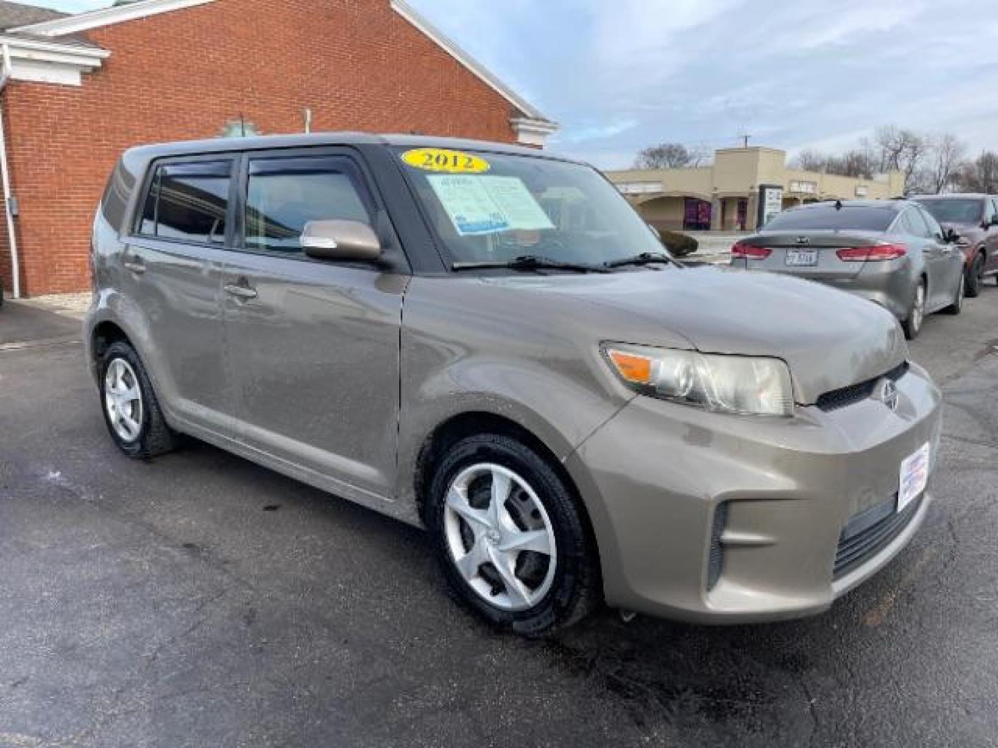 2012 Army Rock Metallic Scion xB 5-Door Wagon 4-Spd AT (JTLZE4FE5CJ) with an 2.4L L4 DOHC 16V engine, 4-Speed Automatic transmission, located at 401 Woodman Dr, Riverside, OH, 45431, (937) 908-9800, 39.763779, -84.122063 - Photo#0