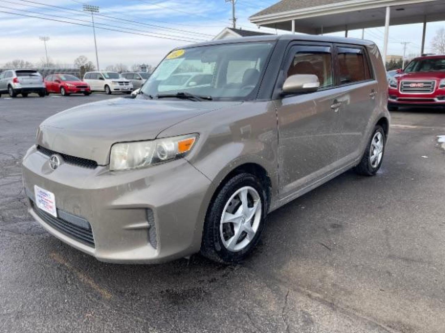 2012 Army Rock Metallic Scion xB 5-Door Wagon 4-Spd AT (JTLZE4FE5CJ) with an 2.4L L4 DOHC 16V engine, 4-Speed Automatic transmission, located at 401 Woodman Dr, Riverside, OH, 45431, (937) 908-9800, 39.763779, -84.122063 - Photo#1