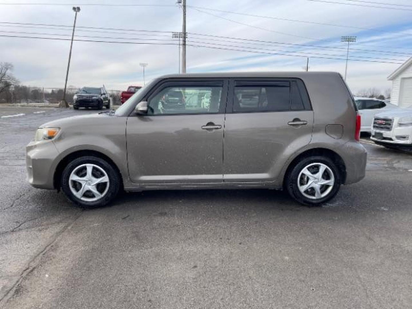 2012 Army Rock Metallic Scion xB 5-Door Wagon 4-Spd AT (JTLZE4FE5CJ) with an 2.4L L4 DOHC 16V engine, 4-Speed Automatic transmission, located at 401 Woodman Dr, Riverside, OH, 45431, (937) 908-9800, 39.763779, -84.122063 - Photo#2