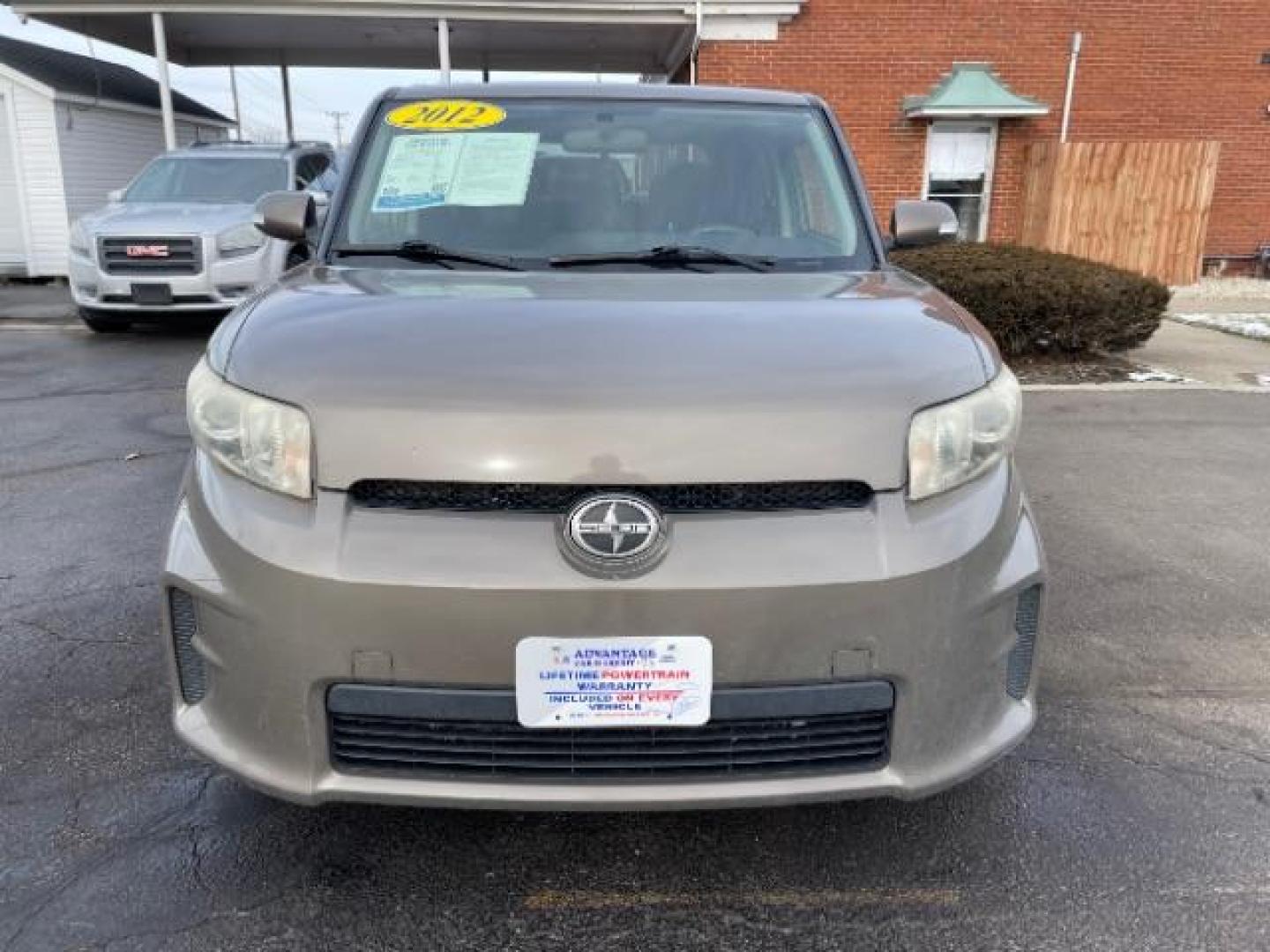 2012 Army Rock Metallic Scion xB 5-Door Wagon 4-Spd AT (JTLZE4FE5CJ) with an 2.4L L4 DOHC 16V engine, 4-Speed Automatic transmission, located at 401 Woodman Dr, Riverside, OH, 45431, (937) 908-9800, 39.763779, -84.122063 - Photo#5