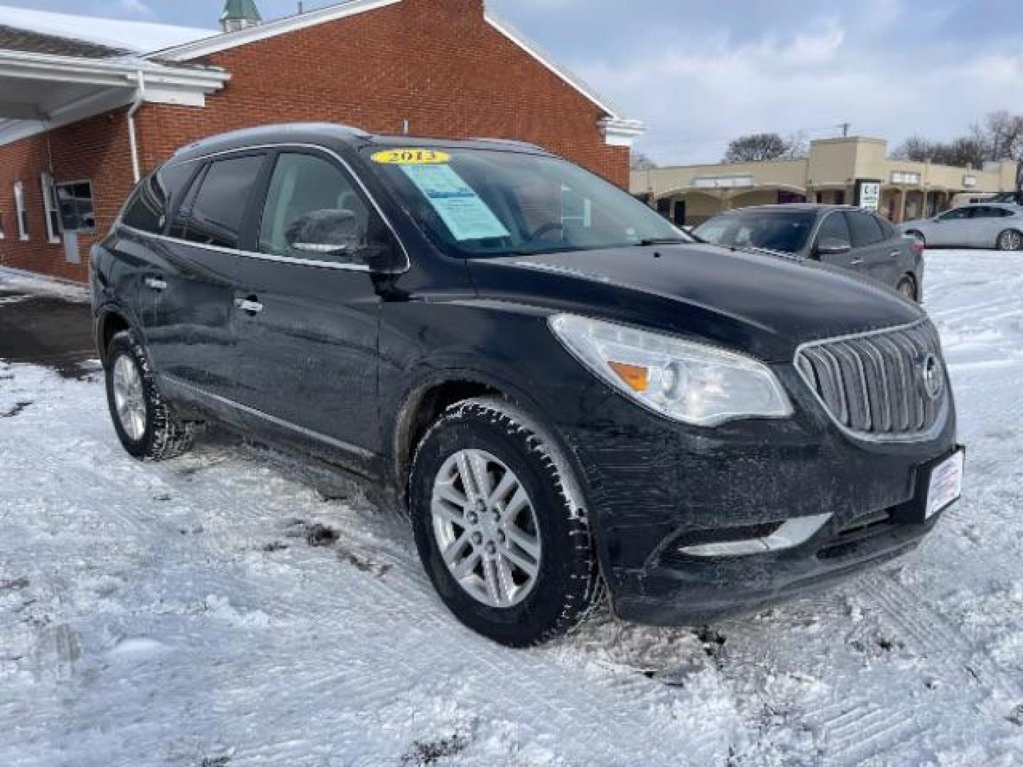 2013 Carbon Black Metallic Buick Enclave Convenience FWD (5GAKRBKD0DJ) with an 3.6L V6 DOHC 24V engine, 6-Speed Automatic Overdrive transmission, located at 1951 S Dayton Lakeview Rd., New Carlisle, OH, 45344, (937) 908-9800, 39.890999, -84.050255 - Photo#0