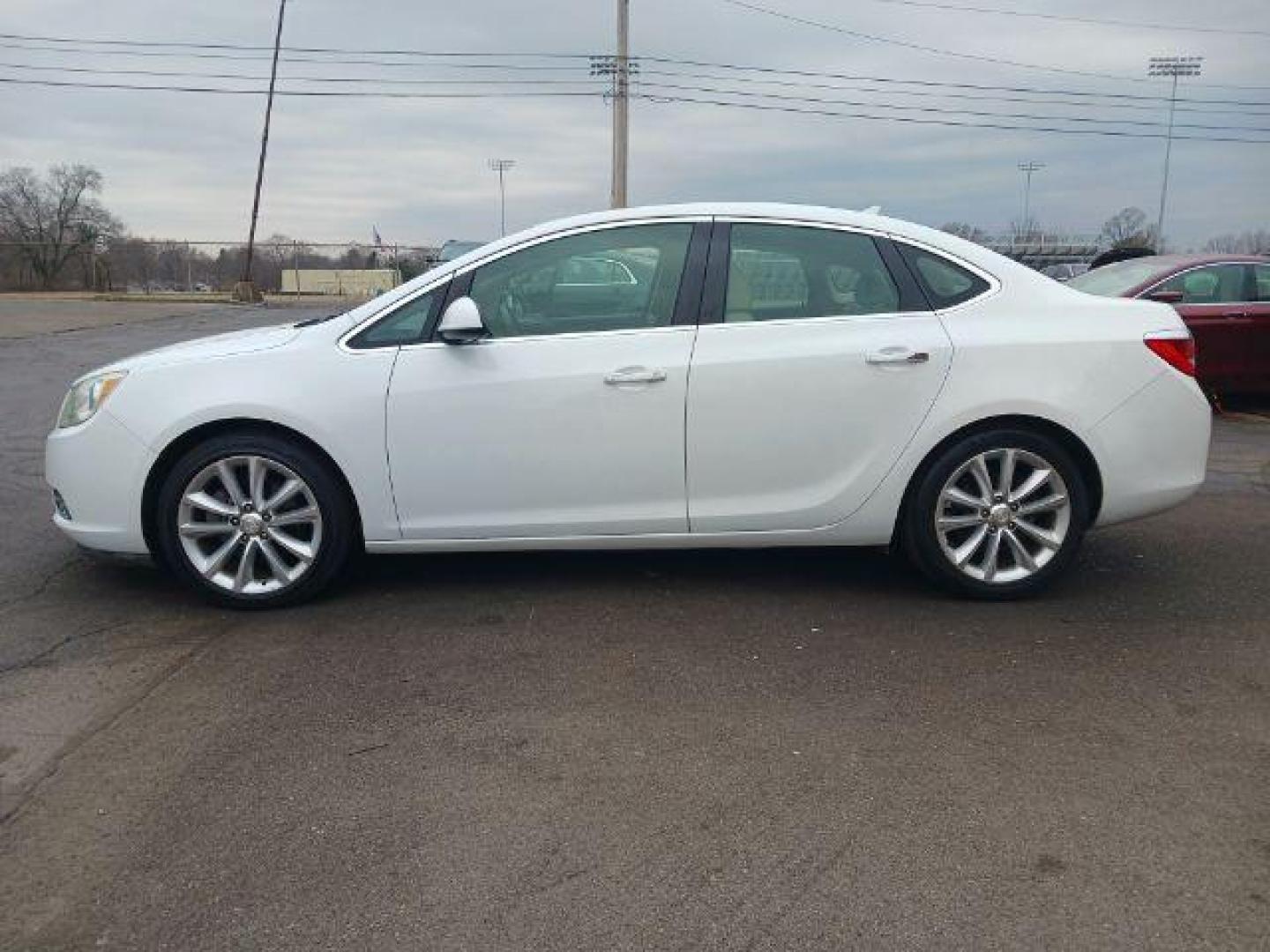 2013 Summit White Buick Verano Base (1G4PP5SKXD4) with an 2.4L L4 DOHC 16V FFV engine, 6-Speed Automatic transmission, located at 880 E. National Road, Vandalia, OH, 45377, (937) 908-9800, 39.892189, -84.181015 - Photo#3