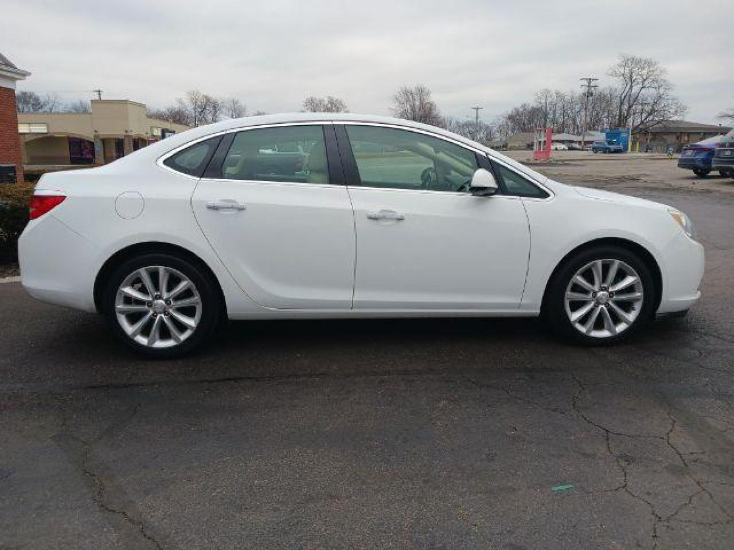 2013 Summit White Buick Verano Base (1G4PP5SKXD4) with an 2.4L L4 DOHC 16V FFV engine, 6-Speed Automatic transmission, located at 880 E. National Road, Vandalia, OH, 45377, (937) 908-9800, 39.892189, -84.181015 - Photo#4