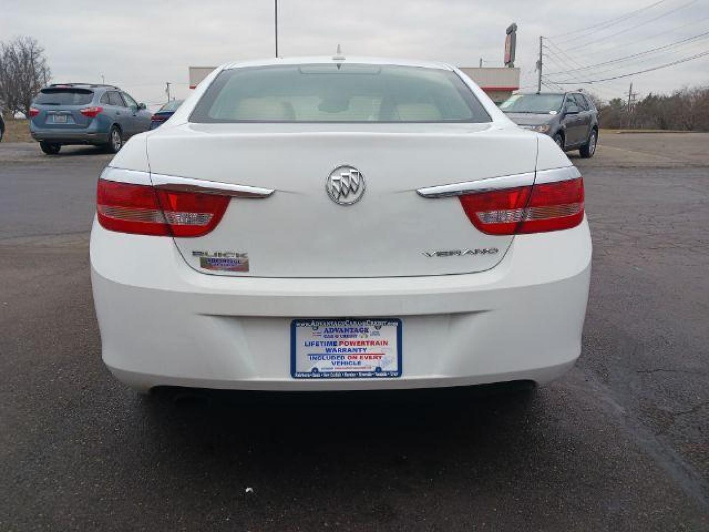 2013 Summit White Buick Verano Base (1G4PP5SKXD4) with an 2.4L L4 DOHC 16V FFV engine, 6-Speed Automatic transmission, located at 880 E. National Road, Vandalia, OH, 45377, (937) 908-9800, 39.892189, -84.181015 - Photo#5