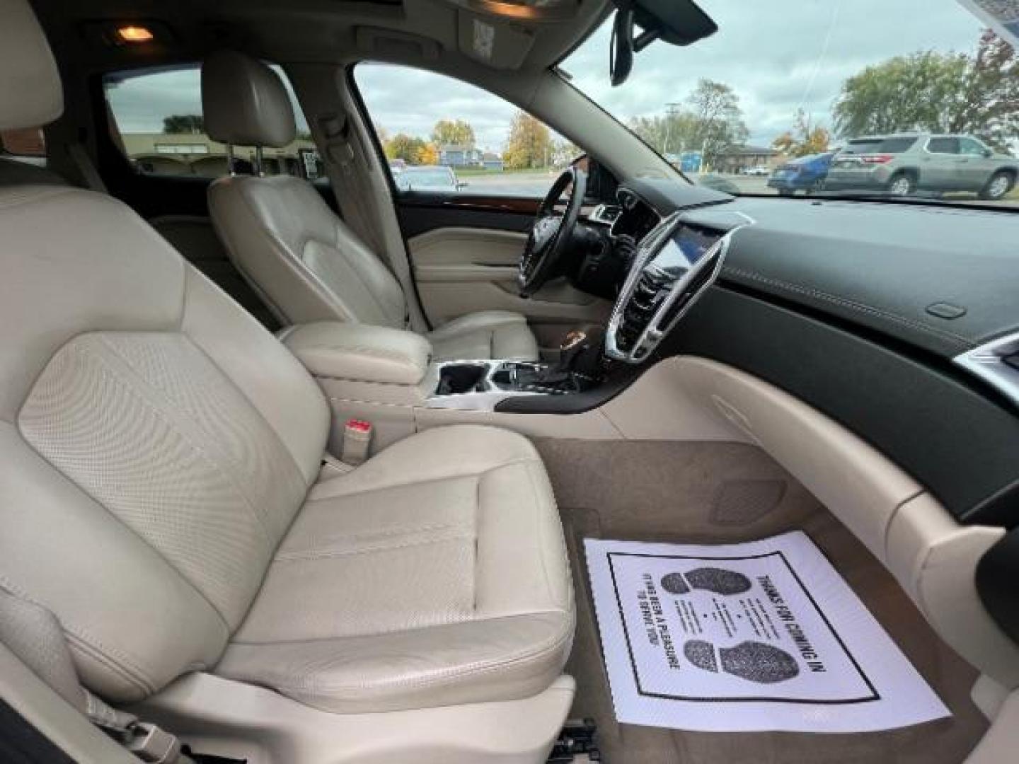 2013 Black Raven Cadillac SRX AWD Luxury Collection (3GYFNGE36DS) with an 3.6L V6 DOHC 24V FFV engine, 6-Speed Automatic transmission, located at 1184 Kauffman Ave, Fairborn, OH, 45324, (937) 908-9800, 39.807365, -84.029114 - Photo#9