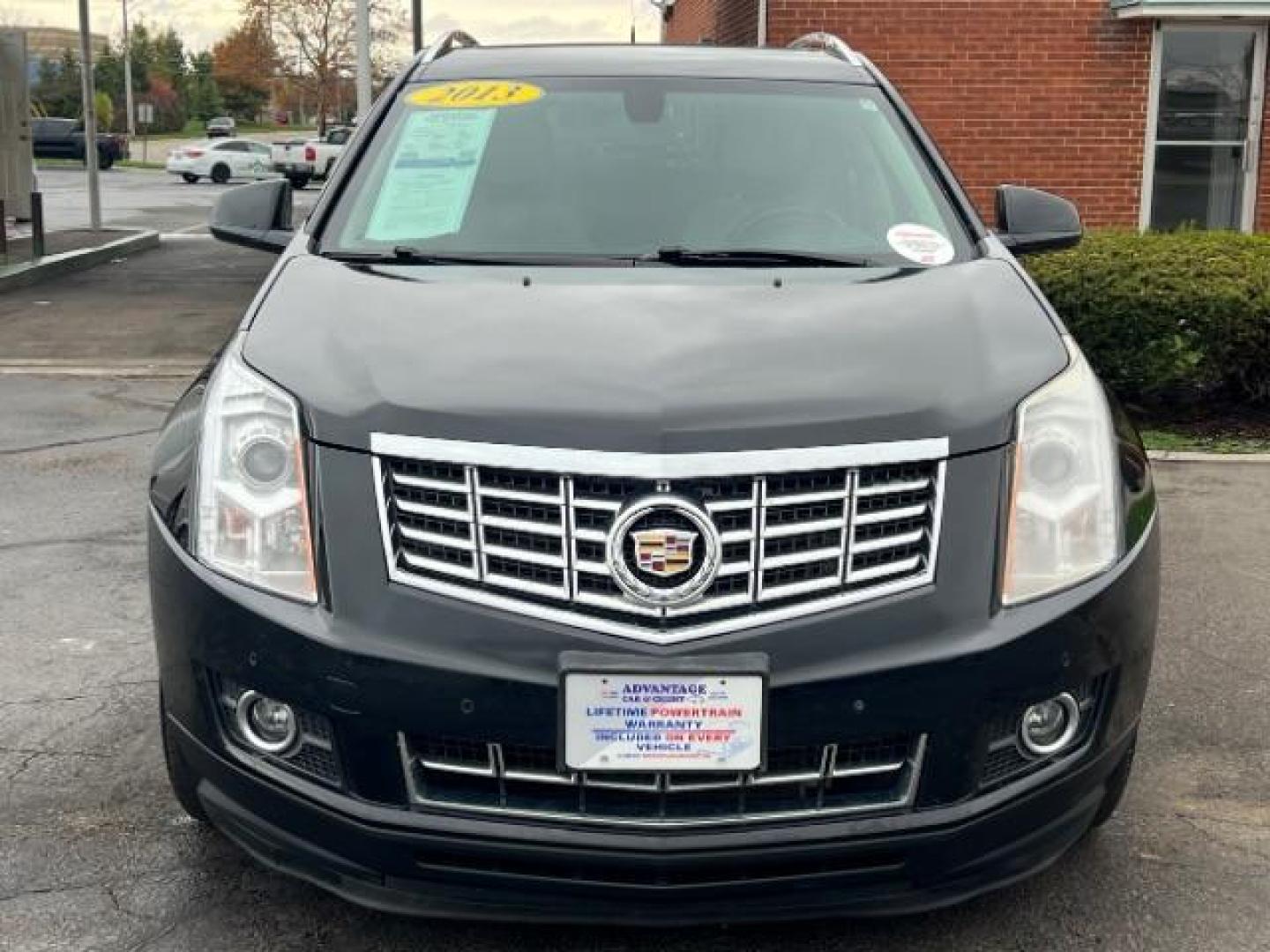 2013 Black Raven Cadillac SRX AWD Luxury Collection (3GYFNGE36DS) with an 3.6L V6 DOHC 24V FFV engine, 6-Speed Automatic transmission, located at 1184 Kauffman Ave, Fairborn, OH, 45324, (937) 908-9800, 39.807365, -84.029114 - Photo#1