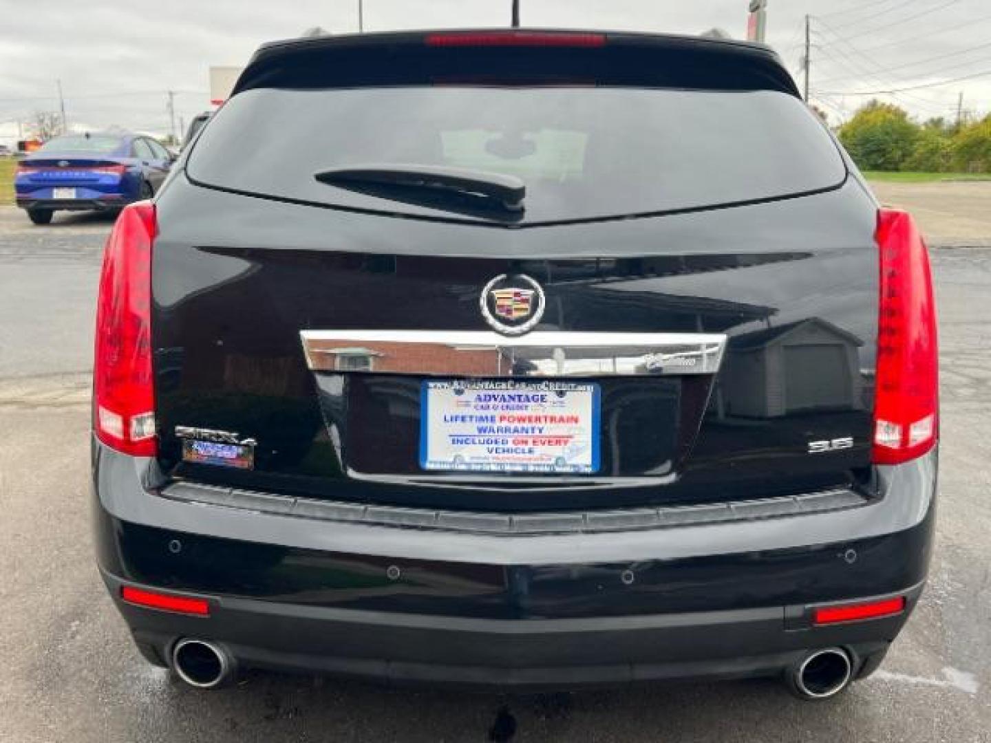 2013 Black Raven Cadillac SRX AWD Luxury Collection (3GYFNGE36DS) with an 3.6L V6 DOHC 24V FFV engine, 6-Speed Automatic transmission, located at 1184 Kauffman Ave, Fairborn, OH, 45324, (937) 908-9800, 39.807365, -84.029114 - Photo#4