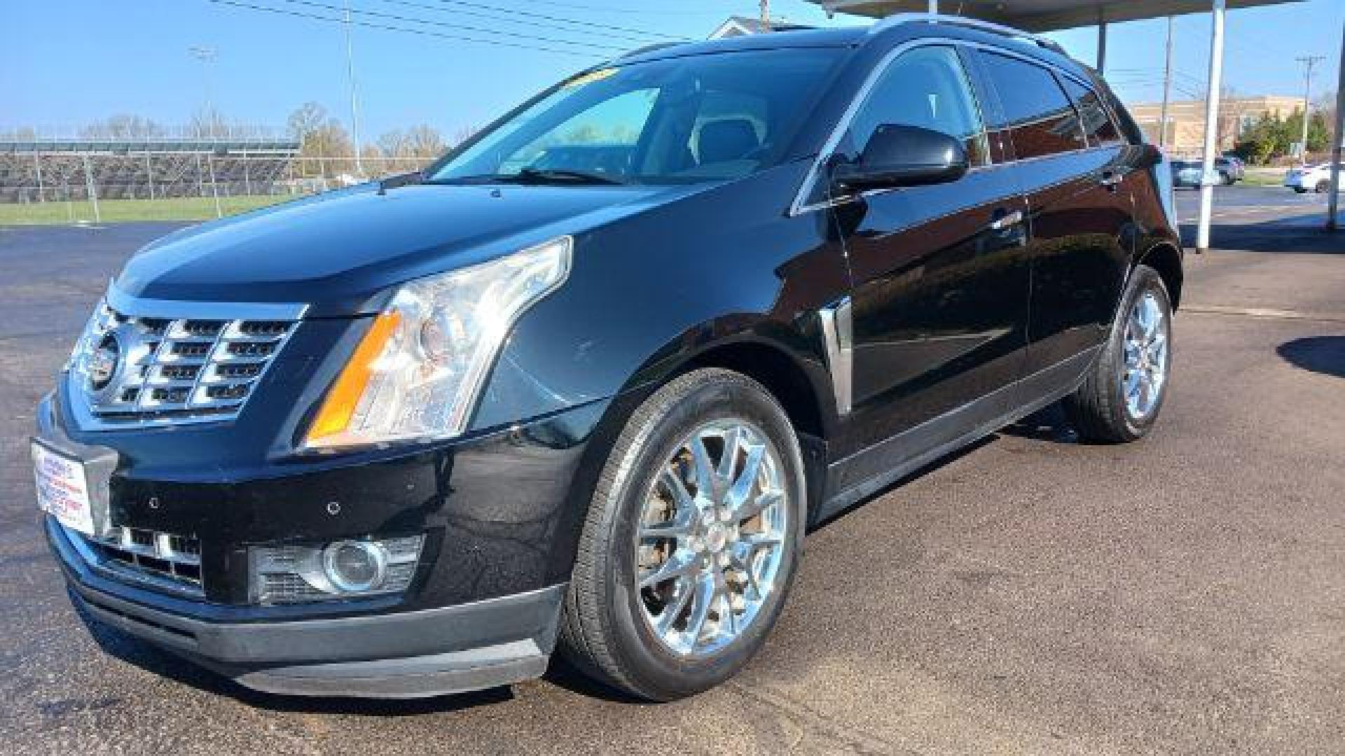 2013 Black Raven Cadillac SRX AWD Performance Collection (3GYFNHE39DS) with an 3.6L V6 DOHC 24V FFV engine, 6-Speed Automatic transmission, located at 1951 S Dayton Lakeview Rd., New Carlisle, OH, 45344, (937) 908-9800, 39.890999, -84.050255 - Photo#3