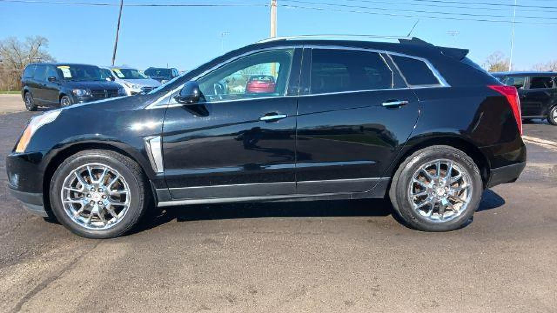 2013 Black Raven Cadillac SRX AWD Performance Collection (3GYFNHE39DS) with an 3.6L V6 DOHC 24V FFV engine, 6-Speed Automatic transmission, located at 1951 S Dayton Lakeview Rd., New Carlisle, OH, 45344, (937) 908-9800, 39.890999, -84.050255 - Photo#4