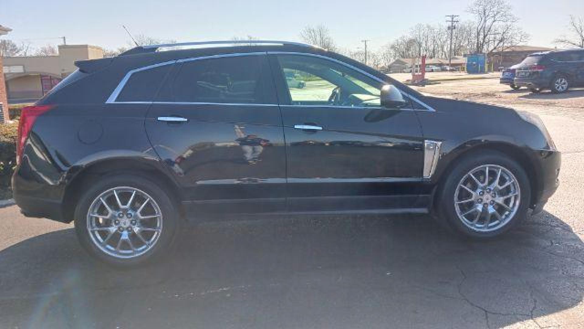 2013 Black Raven Cadillac SRX AWD Performance Collection (3GYFNHE39DS) with an 3.6L V6 DOHC 24V FFV engine, 6-Speed Automatic transmission, located at 1951 S Dayton Lakeview Rd., New Carlisle, OH, 45344, (937) 908-9800, 39.890999, -84.050255 - Photo#5