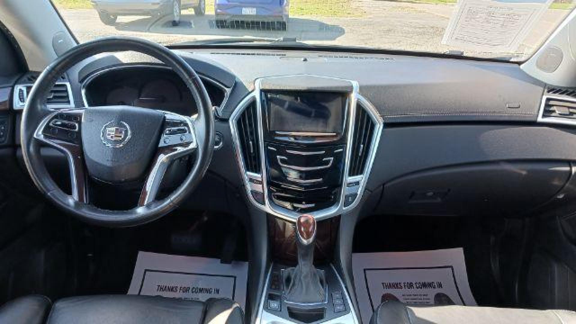 2013 Black Raven Cadillac SRX AWD Performance Collection (3GYFNHE39DS) with an 3.6L V6 DOHC 24V FFV engine, 6-Speed Automatic transmission, located at 1951 S Dayton Lakeview Rd., New Carlisle, OH, 45344, (937) 908-9800, 39.890999, -84.050255 - Photo#7