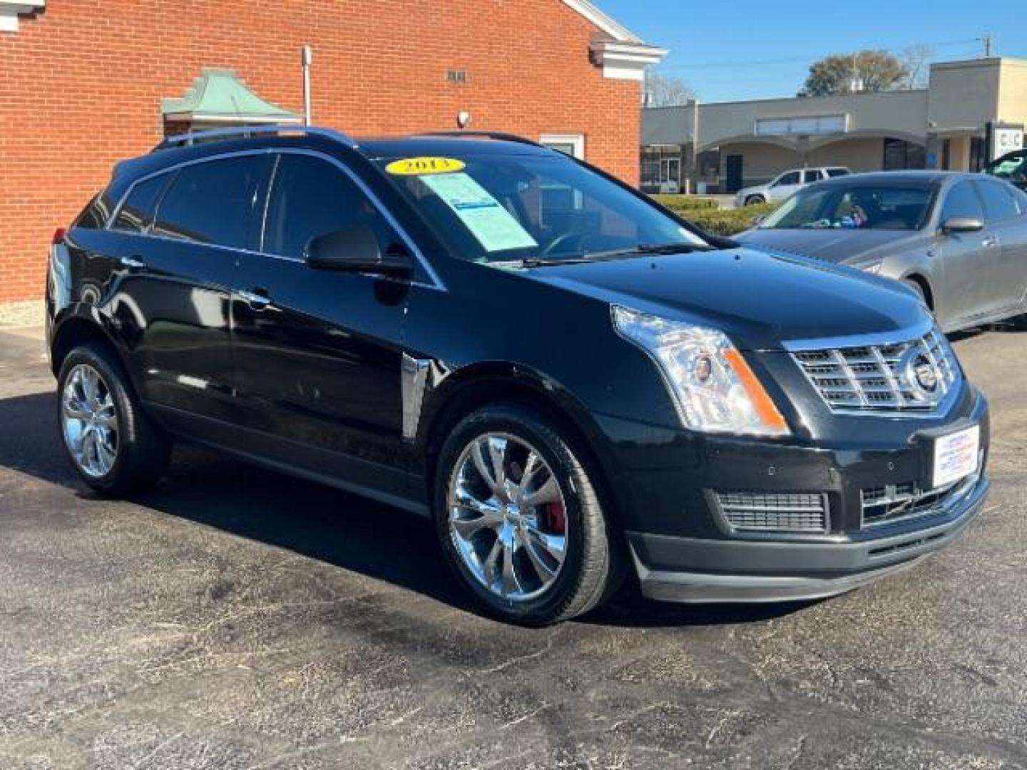 2013 Black Raven Cadillac SRX Luxury Collection (3GYFNCE36DS) with an 3.6L V6 DOHC 24V FFV engine, 6-Speed Automatic transmission, located at 1184 Kauffman Ave, Fairborn, OH, 45324, (937) 908-9800, 39.807365, -84.029114 - Photo#0