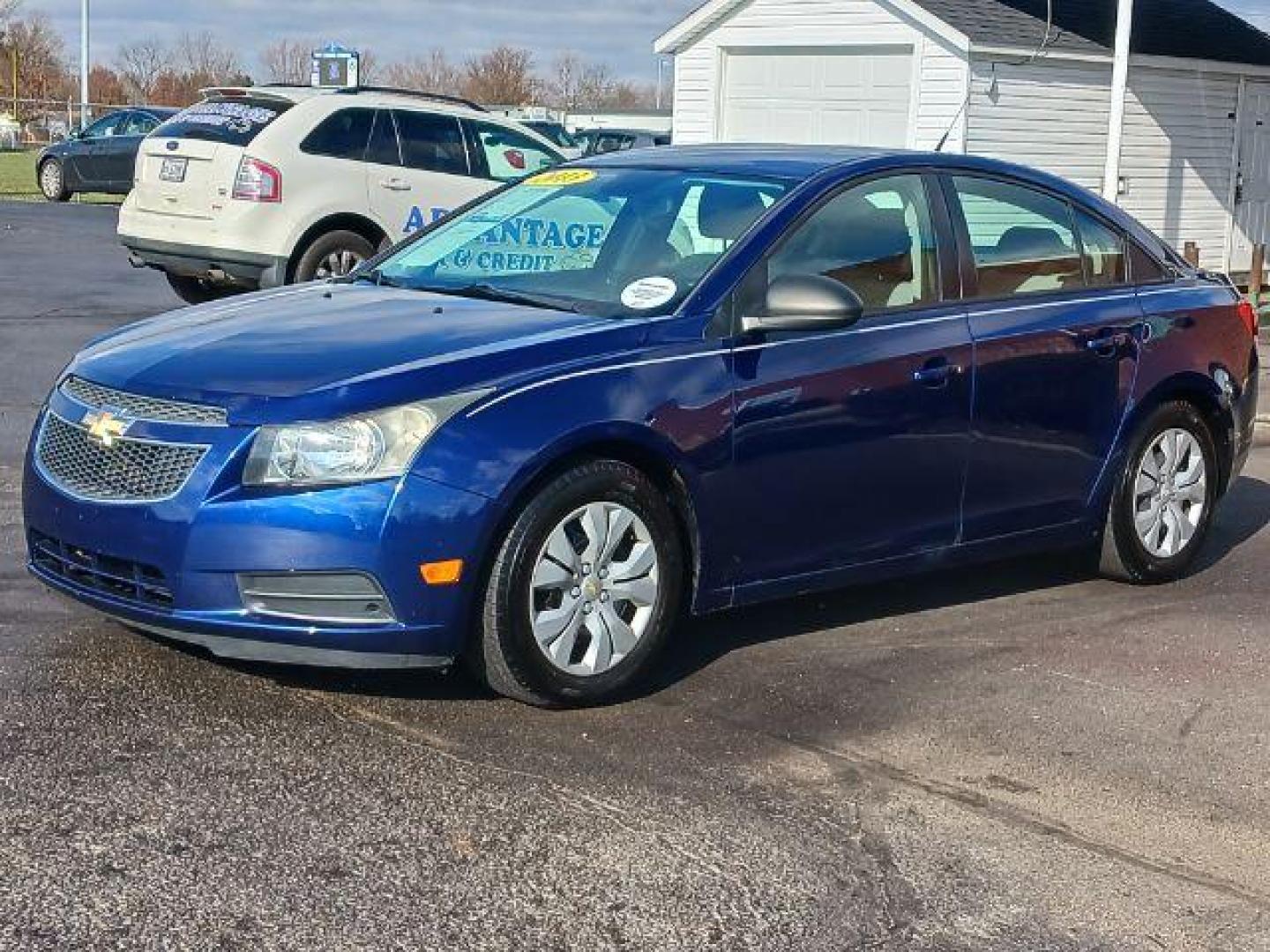 2013 Blue Chevrolet Cruze LS Auto (1G1PA5SH8D7) with an 1.8L L4 DOHC 16V FFV engine, 6-Speed Automatic transmission, located at 401 Woodman Dr, Riverside, OH, 45431, (937) 908-9800, 39.763779, -84.122063 - Photo#2