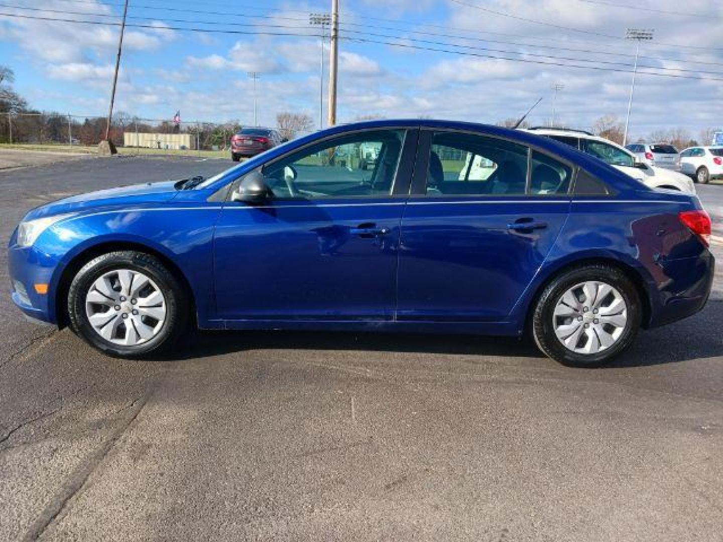 2013 Blue Chevrolet Cruze LS Auto (1G1PA5SH8D7) with an 1.8L L4 DOHC 16V FFV engine, 6-Speed Automatic transmission, located at 401 Woodman Dr, Riverside, OH, 45431, (937) 908-9800, 39.763779, -84.122063 - Photo#3