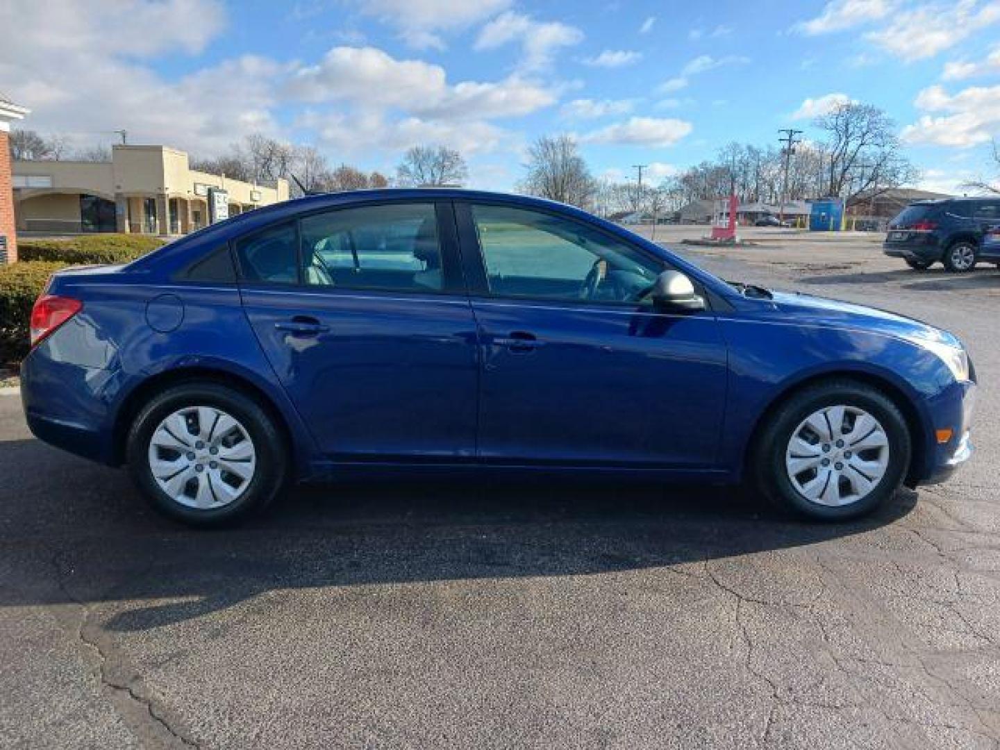 2013 Blue Chevrolet Cruze LS Auto (1G1PA5SH8D7) with an 1.8L L4 DOHC 16V FFV engine, 6-Speed Automatic transmission, located at 401 Woodman Dr, Riverside, OH, 45431, (937) 908-9800, 39.763779, -84.122063 - Photo#4