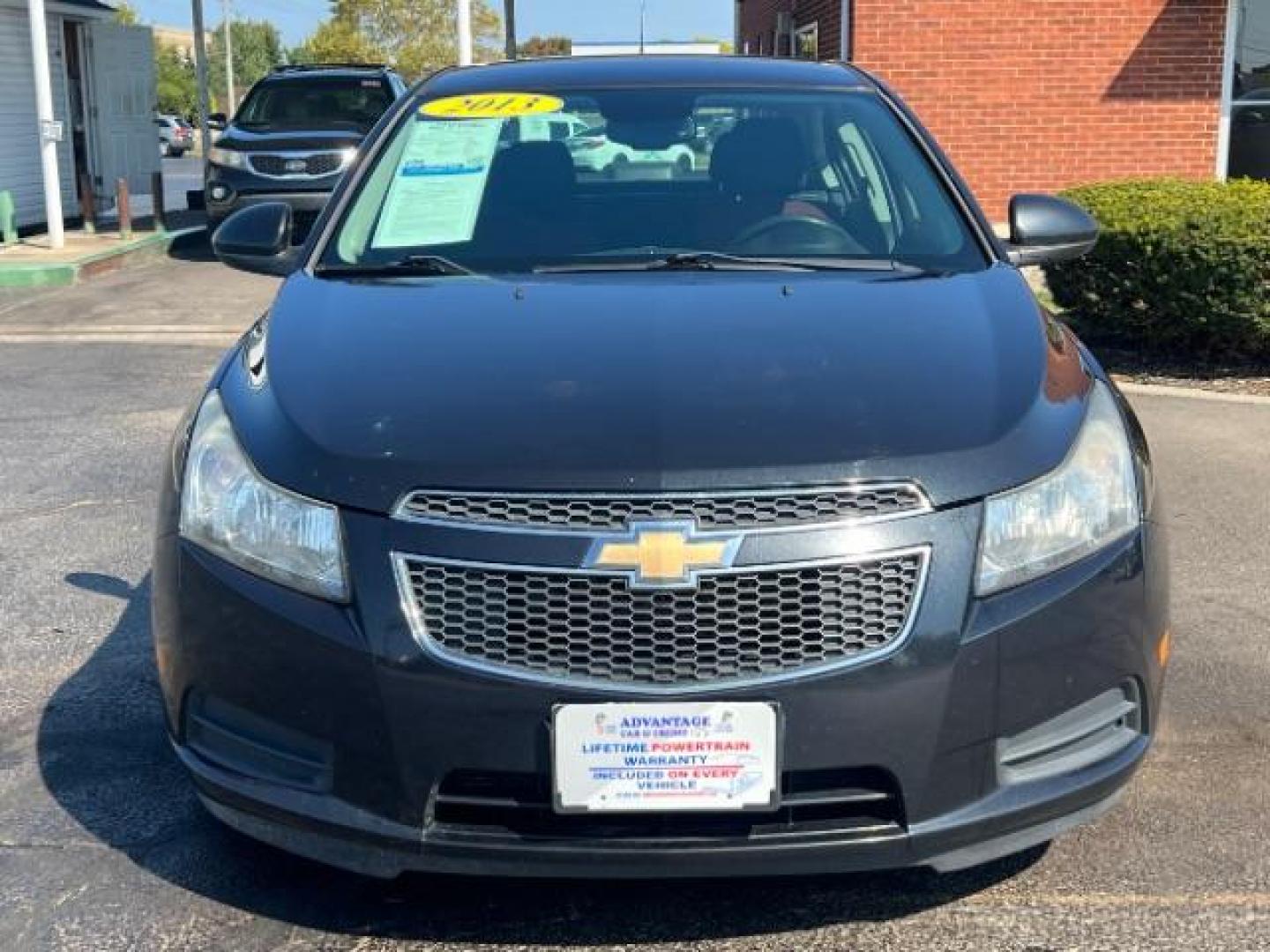 2013 Black Granite Metallic Chevrolet Cruze 1LT Auto (1G1PC5SB1D7) with an 1.4L L4 DOHC 16V TURBO engine, 6-Speed Automatic transmission, located at 880 E. National Road, Vandalia, OH, 45377, (937) 908-9800, 39.892189, -84.181015 - Photo#1