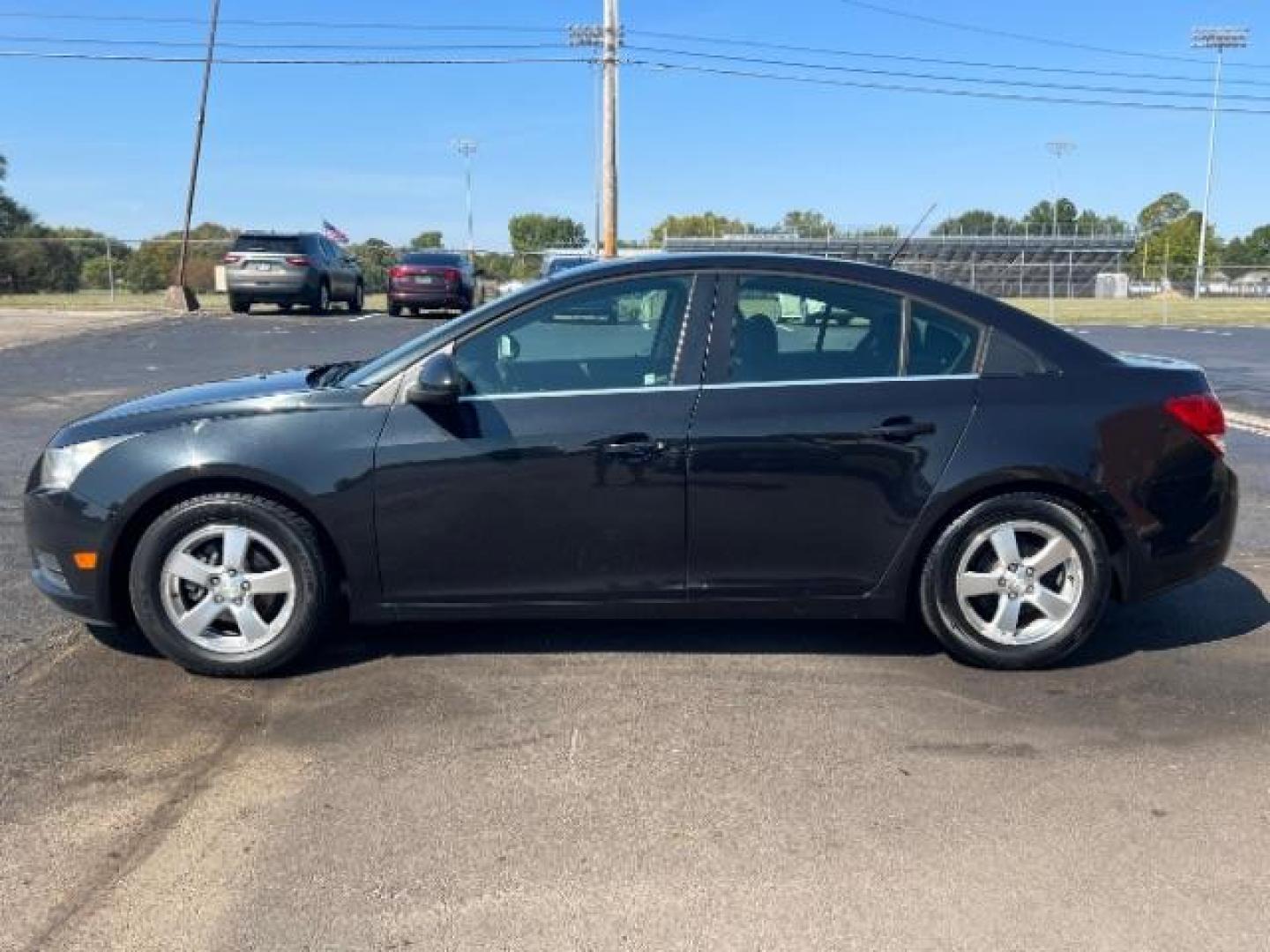 2013 Black Granite Metallic Chevrolet Cruze 1LT Auto (1G1PC5SB1D7) with an 1.4L L4 DOHC 16V TURBO engine, 6-Speed Automatic transmission, located at 880 E. National Road, Vandalia, OH, 45377, (937) 908-9800, 39.892189, -84.181015 - Photo#3