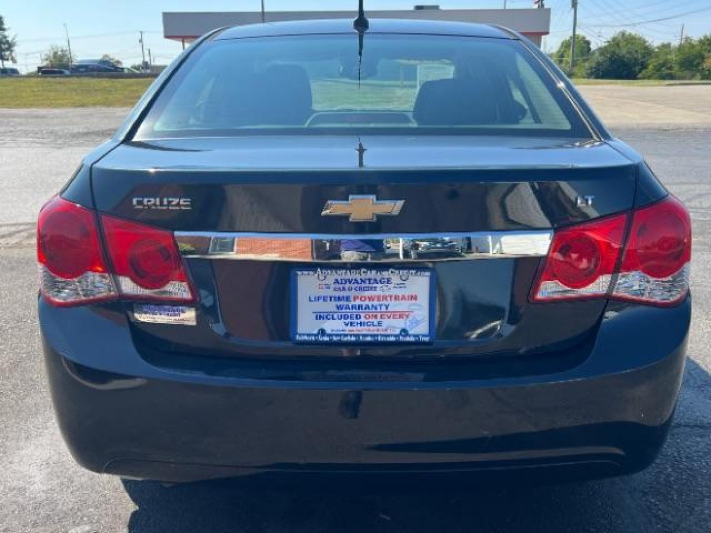 2013 Black Granite Metallic Chevrolet Cruze 1LT Auto (1G1PC5SB1D7) with an 1.4L L4 DOHC 16V TURBO engine, 6-Speed Automatic transmission, located at 880 E. National Road, Vandalia, OH, 45377, (937) 908-9800, 39.892189, -84.181015 - Photo#4