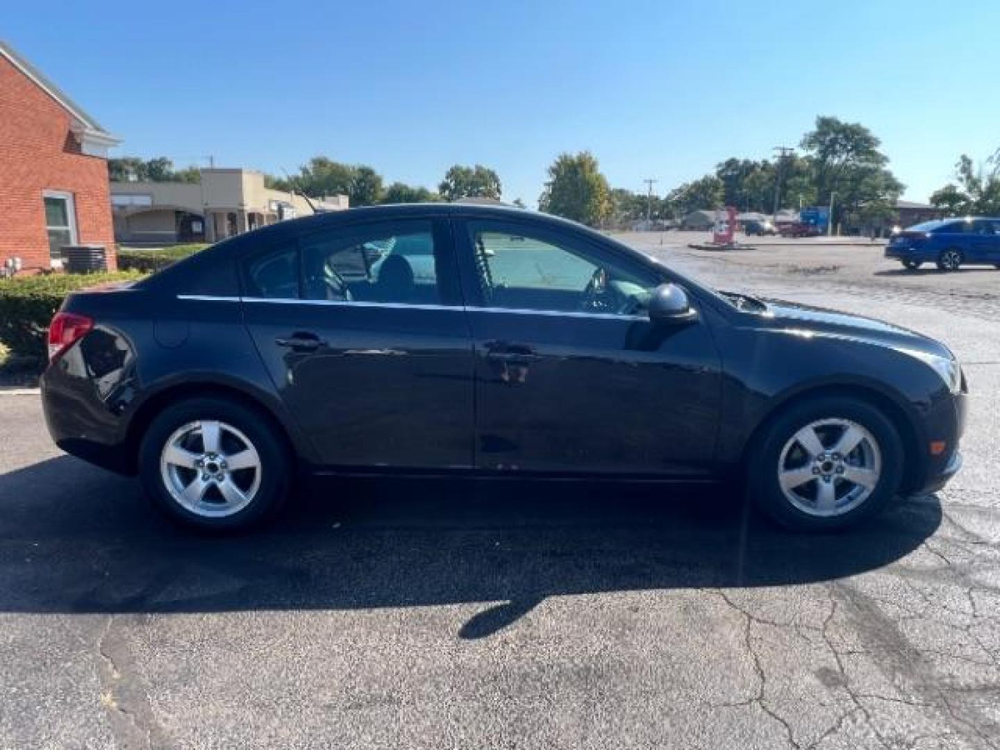 2013 Black Granite Metallic Chevrolet Cruze 1LT Auto (1G1PC5SB1D7) with an 1.4L L4 DOHC 16V TURBO engine, 6-Speed Automatic transmission, located at 880 E. National Road, Vandalia, OH, 45377, (937) 908-9800, 39.892189, -84.181015 - Photo#5