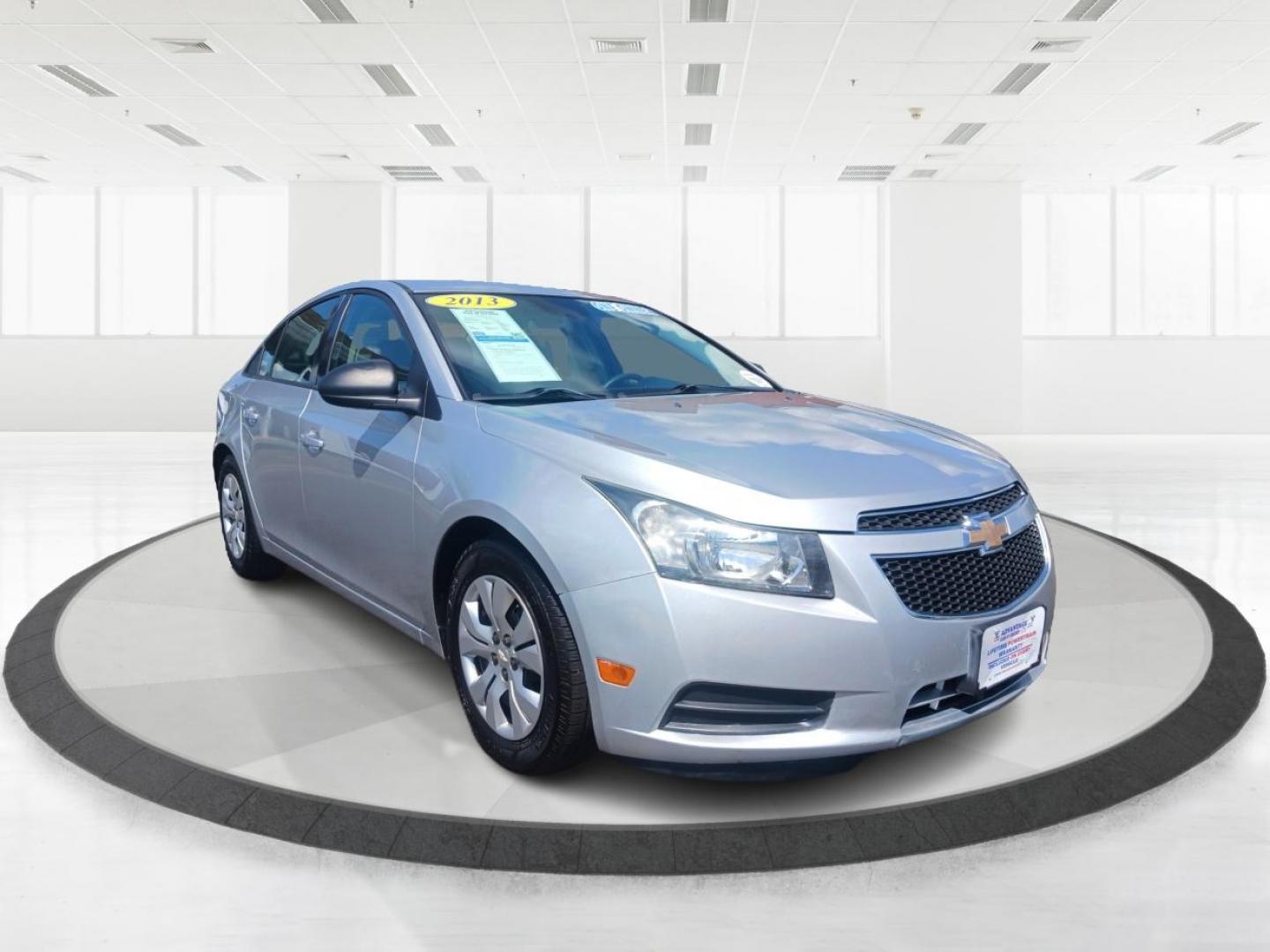 2013 Champagne Silver Metallic Chevrolet Cruze LS Auto (1G1PA5SH8D7) with an 1.8L L4 DOHC 16V FFV engine, 6-Speed Automatic transmission, located at 1184 Kauffman Ave, Fairborn, OH, 45324, (937) 908-9800, 39.807365, -84.029114 - Photo#0