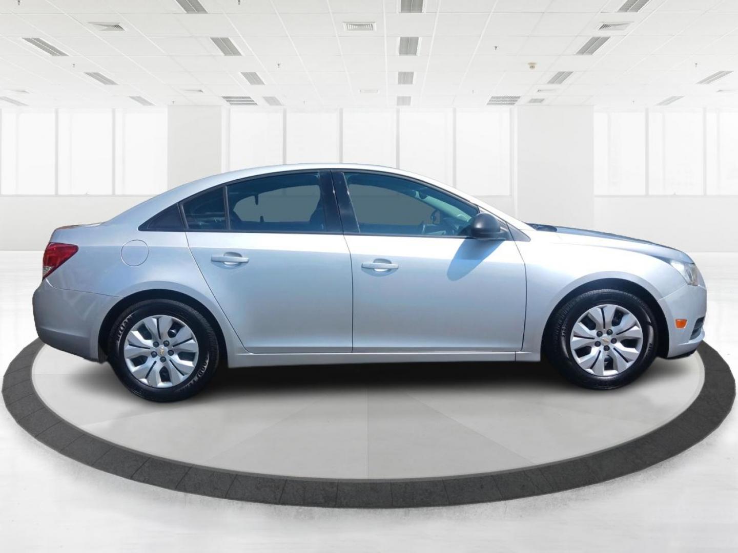 2013 Champagne Silver Metallic Chevrolet Cruze LS Auto (1G1PA5SH8D7) with an 1.8L L4 DOHC 16V FFV engine, 6-Speed Automatic transmission, located at 1184 Kauffman Ave, Fairborn, OH, 45324, (937) 908-9800, 39.807365, -84.029114 - Photo#1