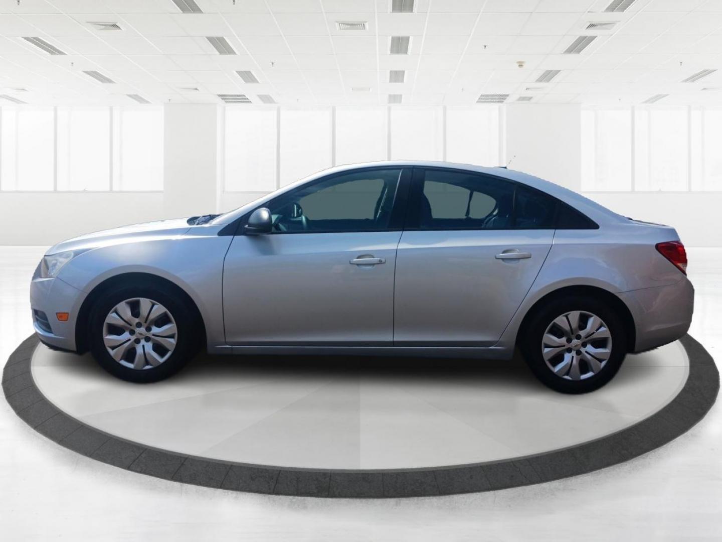 2013 Champagne Silver Metallic Chevrolet Cruze LS Auto (1G1PA5SH8D7) with an 1.8L L4 DOHC 16V FFV engine, 6-Speed Automatic transmission, located at 1184 Kauffman Ave, Fairborn, OH, 45324, (937) 908-9800, 39.807365, -84.029114 - Photo#5