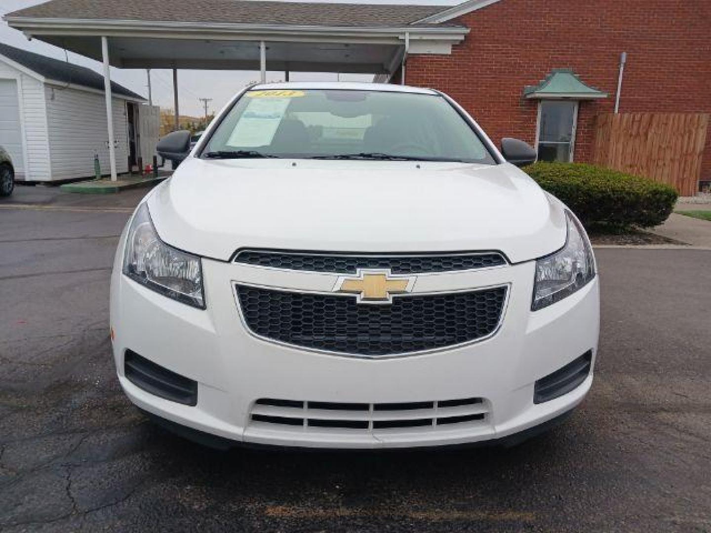 2013 Summit White Chevrolet Cruze LS Auto (1G1PA5SGXD7) with an 1.8L L4 DOHC 16V engine, 6-Speed Automatic transmission, located at 880 E. National Road, Vandalia, OH, 45377, (937) 908-9800, 39.892189, -84.181015 - Photo#1