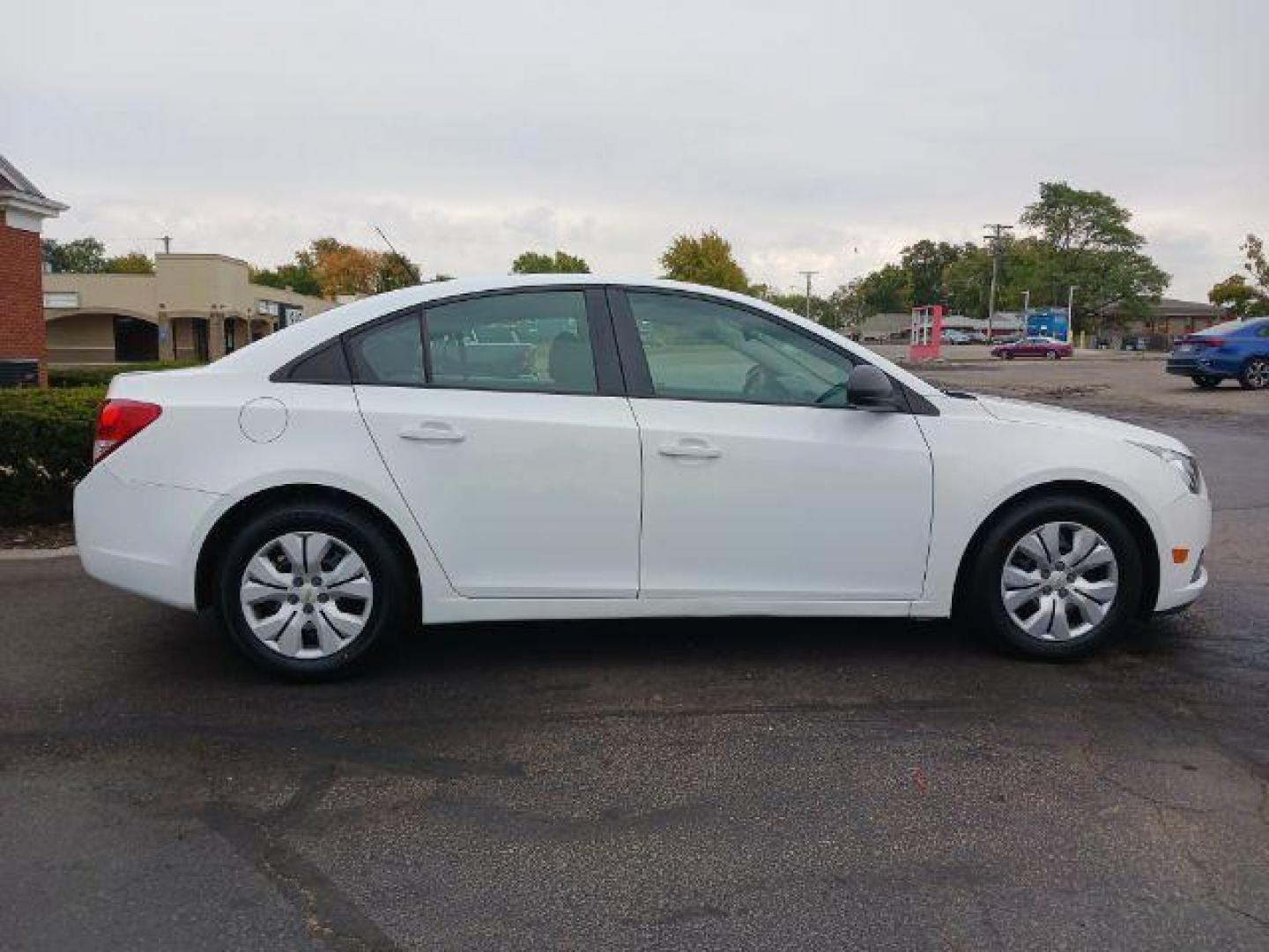 2013 Summit White Chevrolet Cruze LS Auto (1G1PA5SGXD7) with an 1.8L L4 DOHC 16V engine, 6-Speed Automatic transmission, located at 880 E. National Road, Vandalia, OH, 45377, (937) 908-9800, 39.892189, -84.181015 - Photo#4