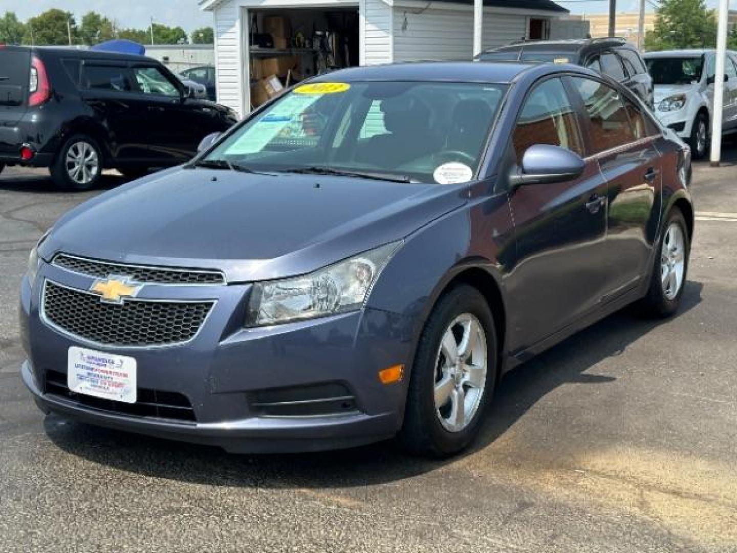 2013 Atlantis Blue Metallic Chevrolet Cruze 1LT Auto (1G1PC5SB3D7) with an 1.4L L4 DOHC 16V TURBO engine, 6-Speed Automatic transmission, located at 1230 East Main St, Xenia, OH, 45385, (937) 908-9800, 39.687321, -83.910294 - Photo#2