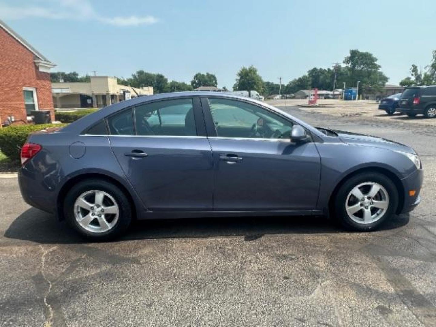 2013 Atlantis Blue Metallic Chevrolet Cruze 1LT Auto (1G1PC5SB3D7) with an 1.4L L4 DOHC 16V TURBO engine, 6-Speed Automatic transmission, located at 1230 East Main St, Xenia, OH, 45385, (937) 908-9800, 39.687321, -83.910294 - Photo#4