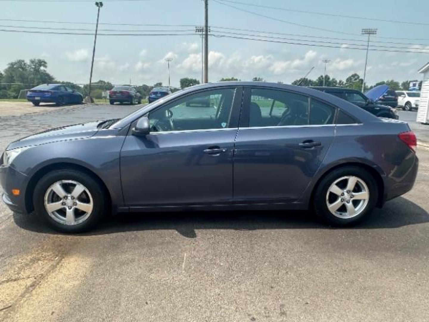 2013 Atlantis Blue Metallic Chevrolet Cruze 1LT Auto (1G1PC5SB3D7) with an 1.4L L4 DOHC 16V TURBO engine, 6-Speed Automatic transmission, located at 1230 East Main St, Xenia, OH, 45385, (937) 908-9800, 39.687321, -83.910294 - Photo#5